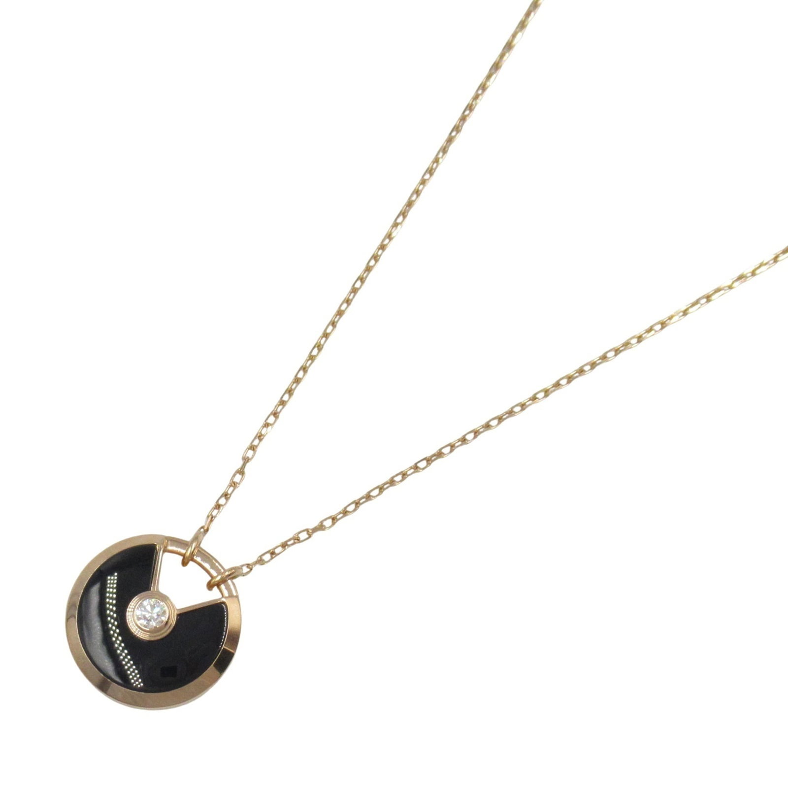 Clear and Black. - Cartier Onyx Amulet Necklace in 18K Pink Gold with Diamonds: Clear and Black. - Cartier Onyx Amulet Necklace in 18K Pink Gold with Diamonds This listing features Clear and Black. - Cartier Onyx Amulet Necklace in 18K Pink Gold with Diamonds. Item specifics are
