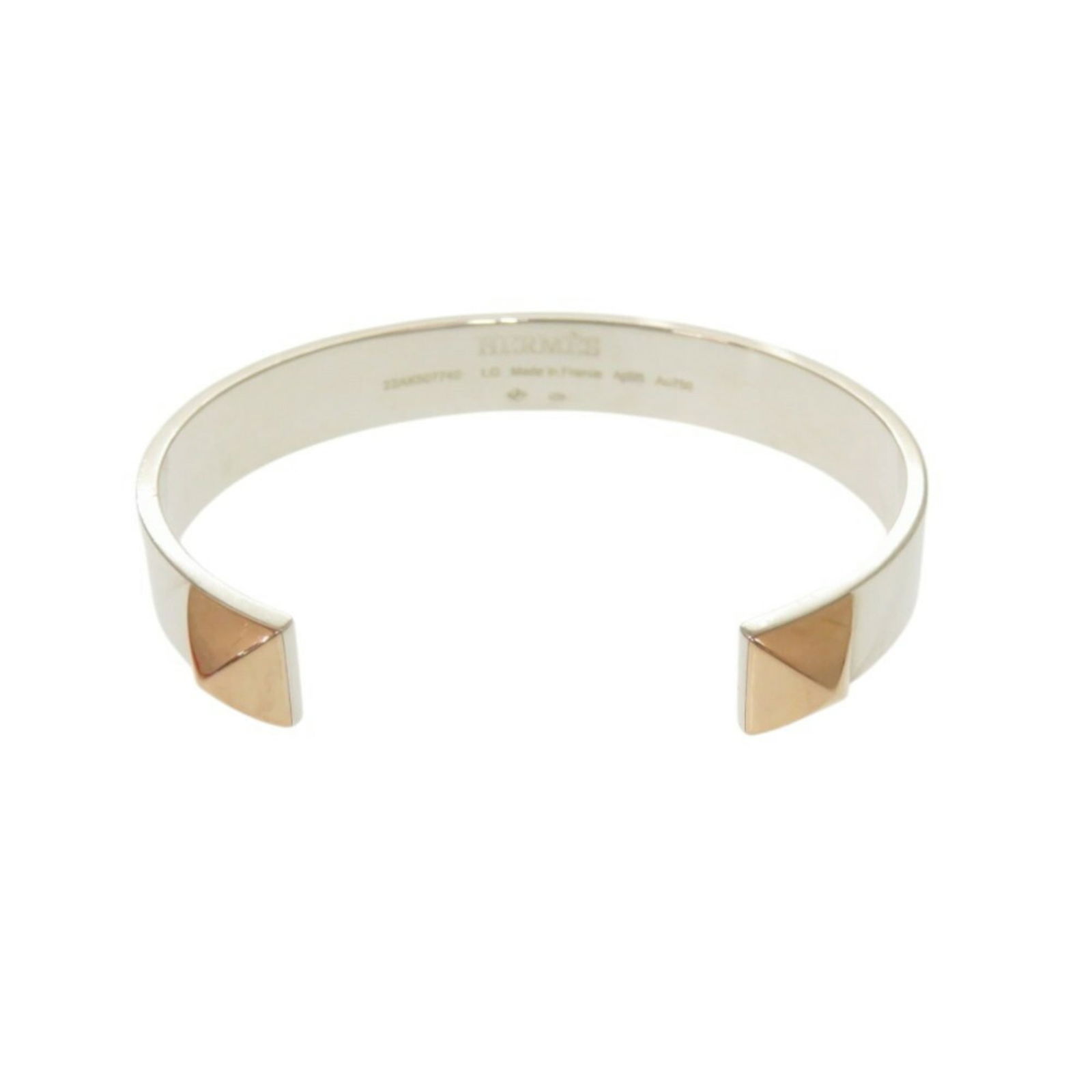 Silver 925 - Hermes Bangle Pink Gold (18K): Silver 925 - Hermes Bangle Pink Gold (18K) This listing features Silver 925 - Hermes Bangle Pink Gold (18K). Item specifics are provided below. Item Specifics: Brand: Hermes Type: Bangle Gender: