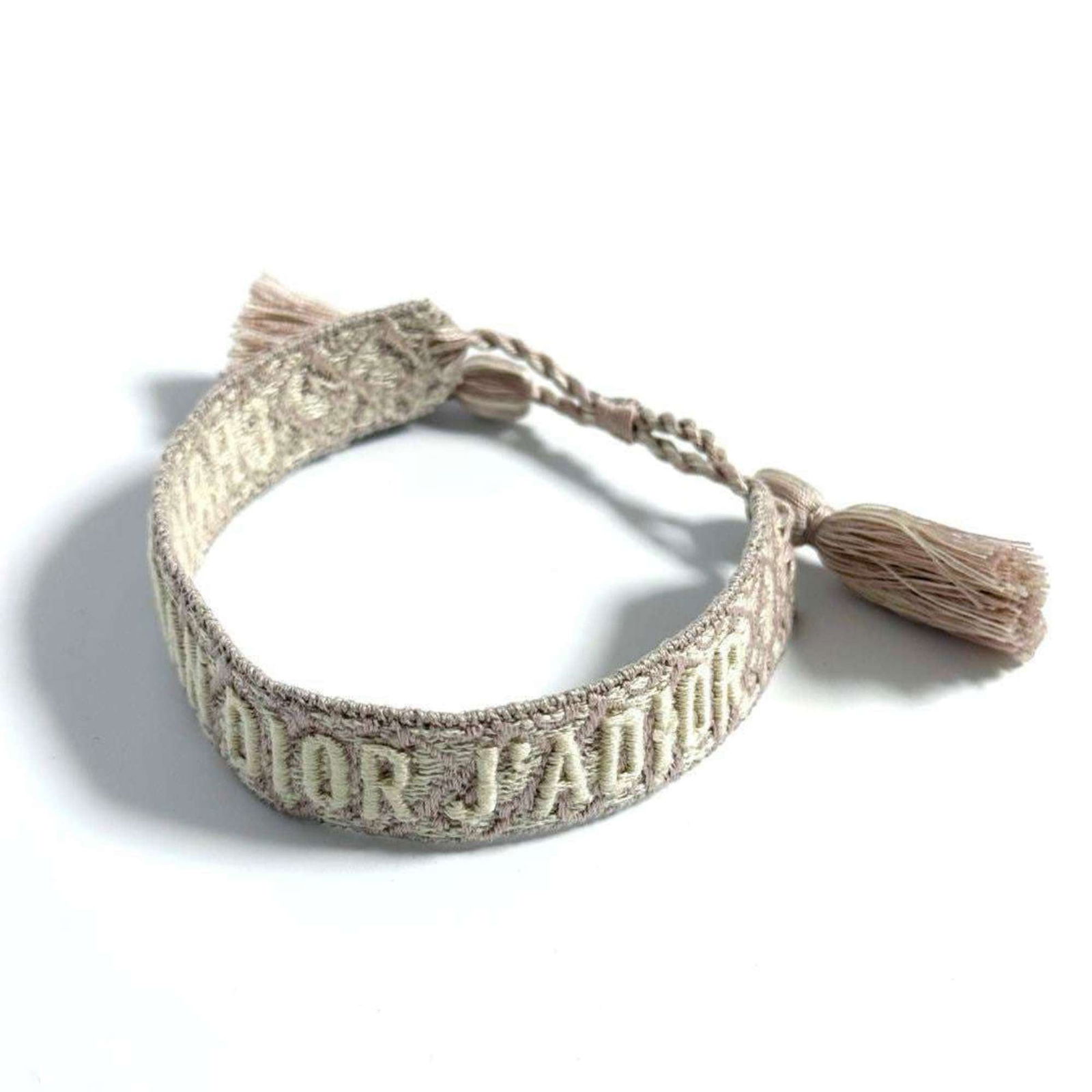 Canvas Christian Dior Charm Bracelet: Canvas Christian Dior Charm Bracelet This listing features Canvas Christian Dior Charm Bracelet. Item specifics are provided below. Item Specifics: Brand: Christian Dior Type: Charm Bracelet Gender: W