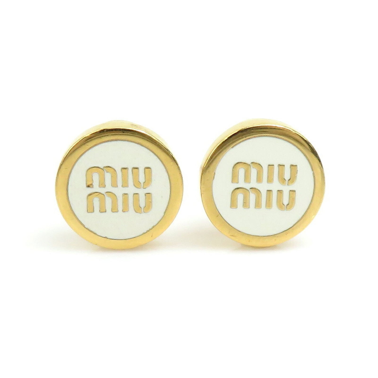 Metal Miu Stud Earrings: Metal Miu Stud Earrings This listing features Metal Miu Stud Earrings. Item specifics are provided below. Item Specifics: Brand: Miu Miu Type: Stud Earrings Gender: Women Material: Metal Color: Gold,