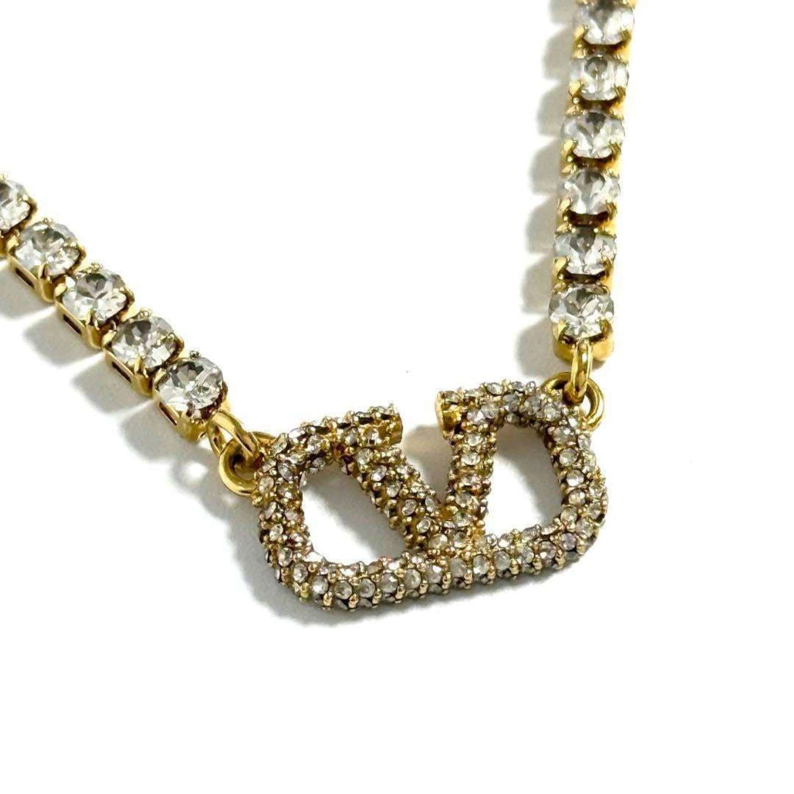 necklace Valentino V logo signature pendant: necklace Valentino V logo signature pendant This listing features necklace Valentino V logo signature pendant. Item specifics are provided below. Item Specifics: Brand: Valentino Necklace Type: