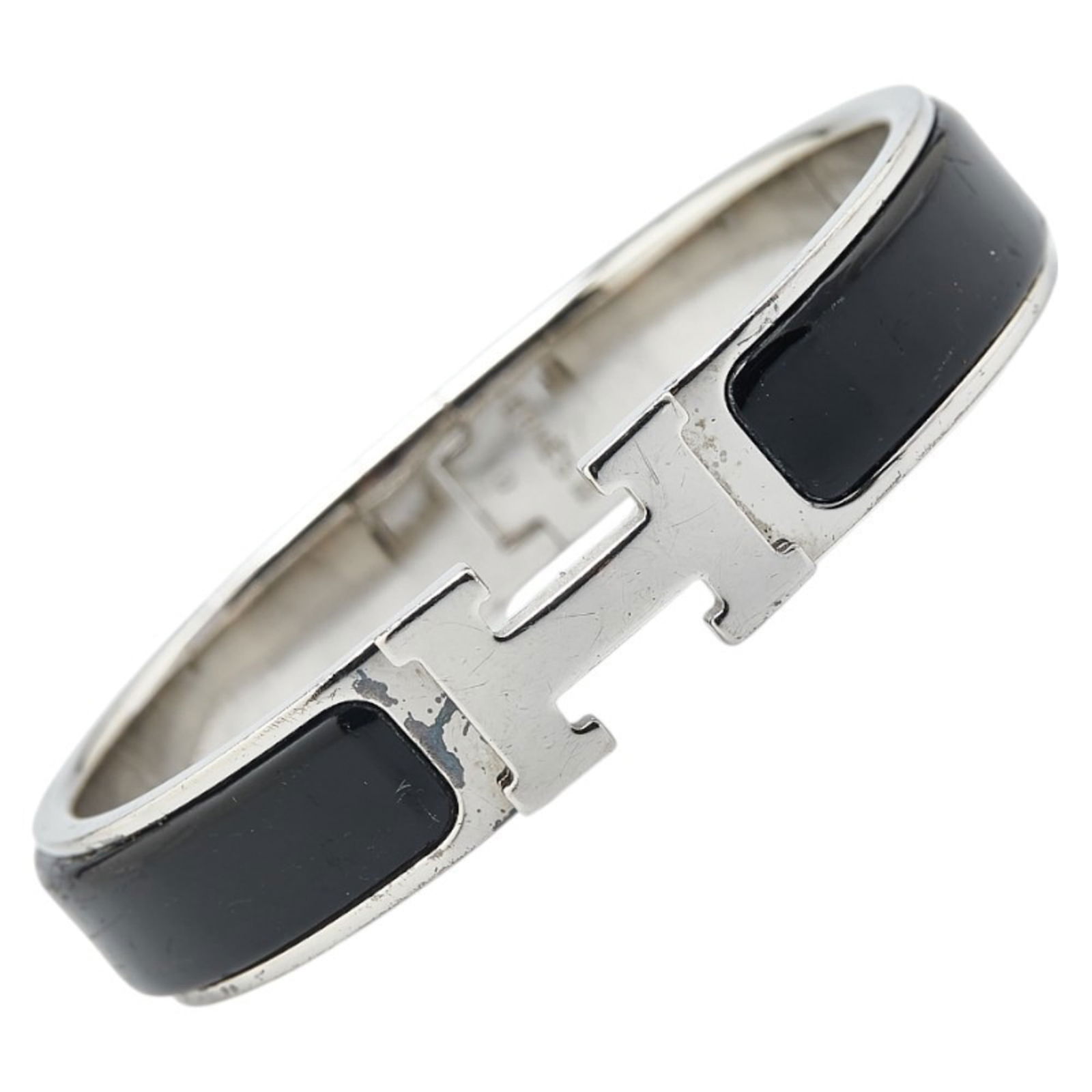 Metal Hermes Bangle: Metal Hermes Bangle This listing features Metal Hermes Bangle. Item specifics are provided below. Item Specifics: Brand: Hermes Type: Bangle Gender: Women Material: Metal Color: Black, Silver