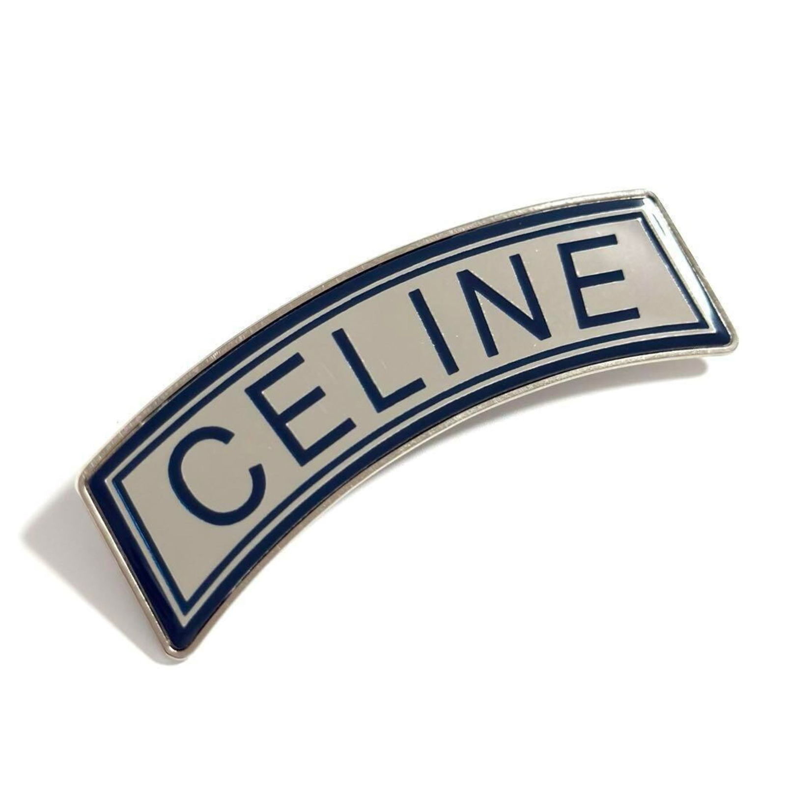 Metal Celine Brooch: Metal Celine Brooch This listing features Metal Celine Brooch. Item specifics are provided below. Item Specifics: Brand: Celine Type: Brooch Gender: Men,Women Material: Metal Color: Blue, Silver