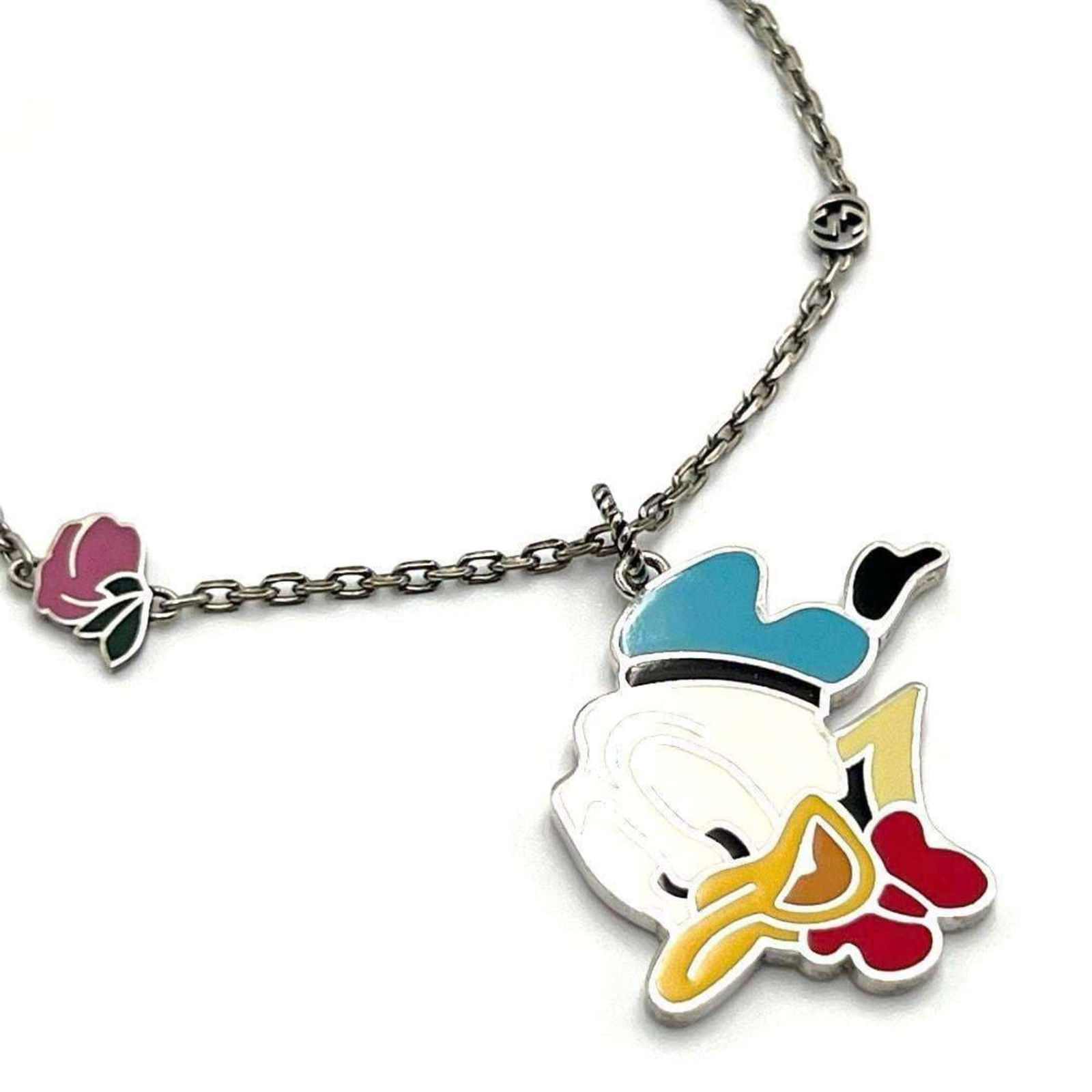 925 GUCCI x Disney Donald Long Pendant Necklace Women's Silver: 925 GUCCI x Disney Donald Long Pendant Necklace Women's Silver This listing features 925 GUCCI x Disney Donald Long Pendant Necklace Women's Silver. Item specifics are provided below. Item