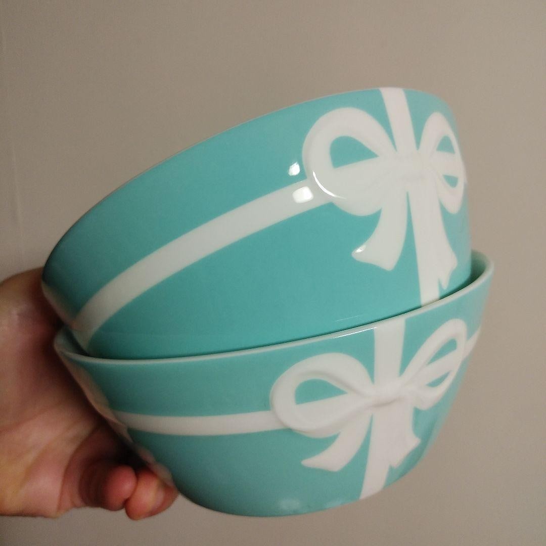Tiffany & Co. Blue Bow Ribbon Bone China Collectible Tableware Set of 2: Tiffany & Co. Blue Bow Ribbon Bone China Collectible Tableware Set of 2 Add a touch of elegance to your table with this exquisite Tiffany & Co. Blue Bow Ribbon Bone China collectible set, crafted