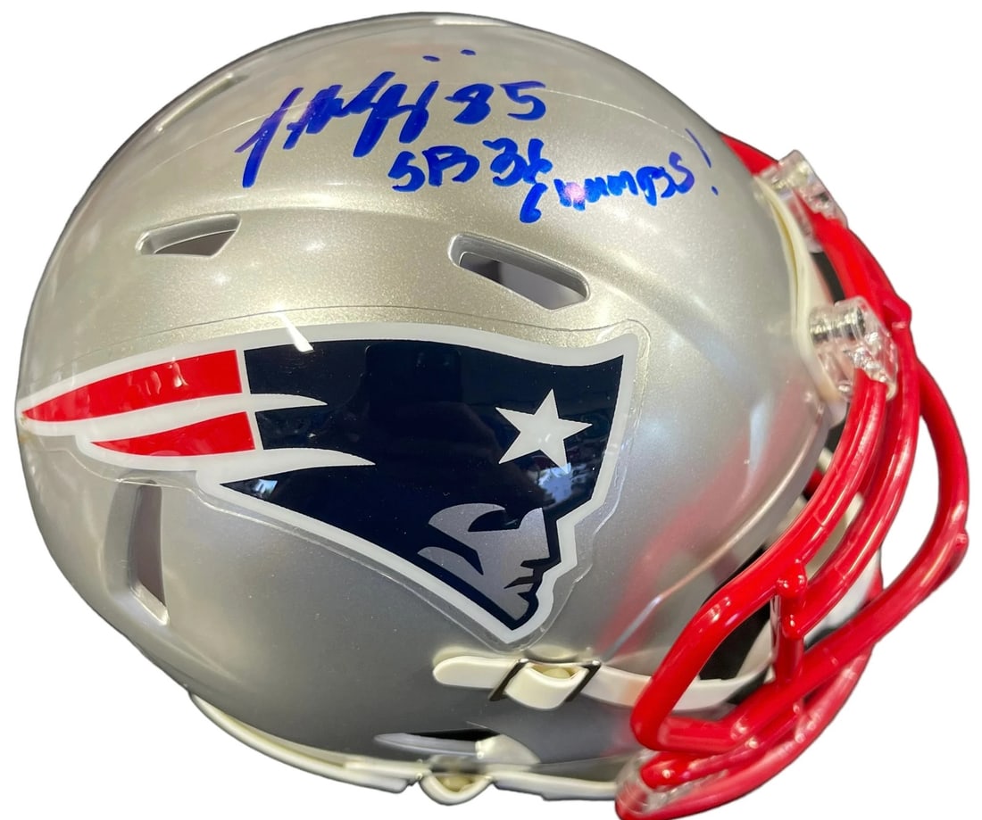 (JS Jermaine Wiggins "SB 36 Champs" Autographed New England Patriots Mini Helmet: (JS Jermaine Wiggins "SB 36 Champs" Autographed New England Patriots Mini Helmet Own a piece of Patriots history with this autographed mini helmet, signed by Jermaine Wiggins in blue sharpie across th
