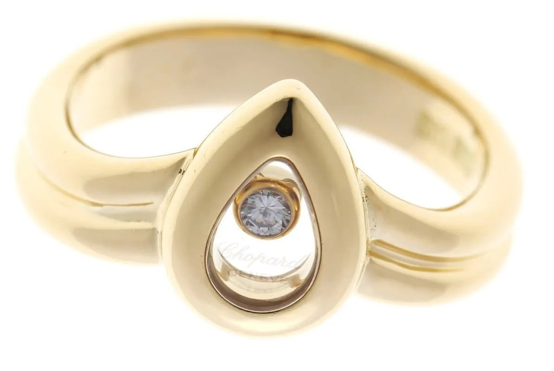 EU52 Chopard Vintage Happy Diamonds Pear Shape Moving 18k Yellow Gold Ring US6.5: EU52 Chopard Vintage Happy Diamonds Pear Shape Moving 18k Yellow Gold Ring US6.5 Experience the timeless elegance of Chopard's vintage Happy Diamonds collection in this stunning 18k yellow gold pear-s