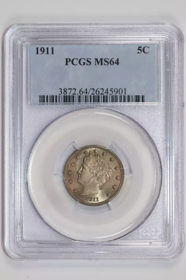 PCGS MS64 Liberty V Nickel 1911: PCGS MS64 Liberty V Nickel 1911 A standout example of American numismatics, this PCGS MS64 Liberty V Nickel 1911 is a rare and highly sought-after coin featuring the iconic Liberty Head design.