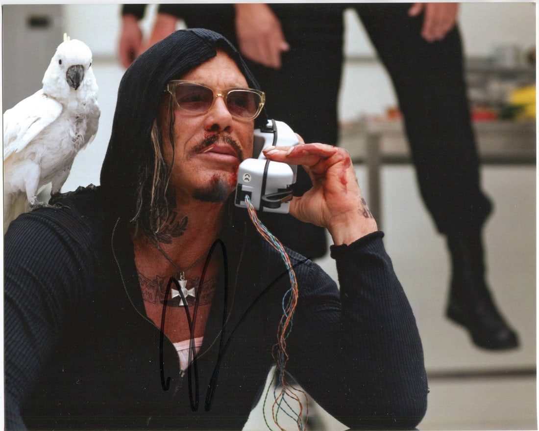 Photo Mickey Rourke Autographed 8x10: Photo Mickey Rourke Autographed 8x10 Get ready to own a piece of Hollywood history with this authentic 8x10 photo of Mickey Rourke, signed in black sharpie by the actor himself. Authenticated by renow