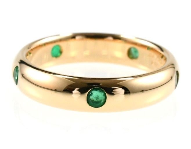 circe1992 Vintage Cartier Stella Emerald 18k Yellow Gold Band Ring EU50 US5.25: circe1992 Vintage Cartier Stella Emerald 18k Yellow Gold Band Ring EU50 US5.25 A stunning vintage Cartier Stella Emerald ring, set in 18k yellow gold and boasting a vibrant round-cut emerald gemstone,