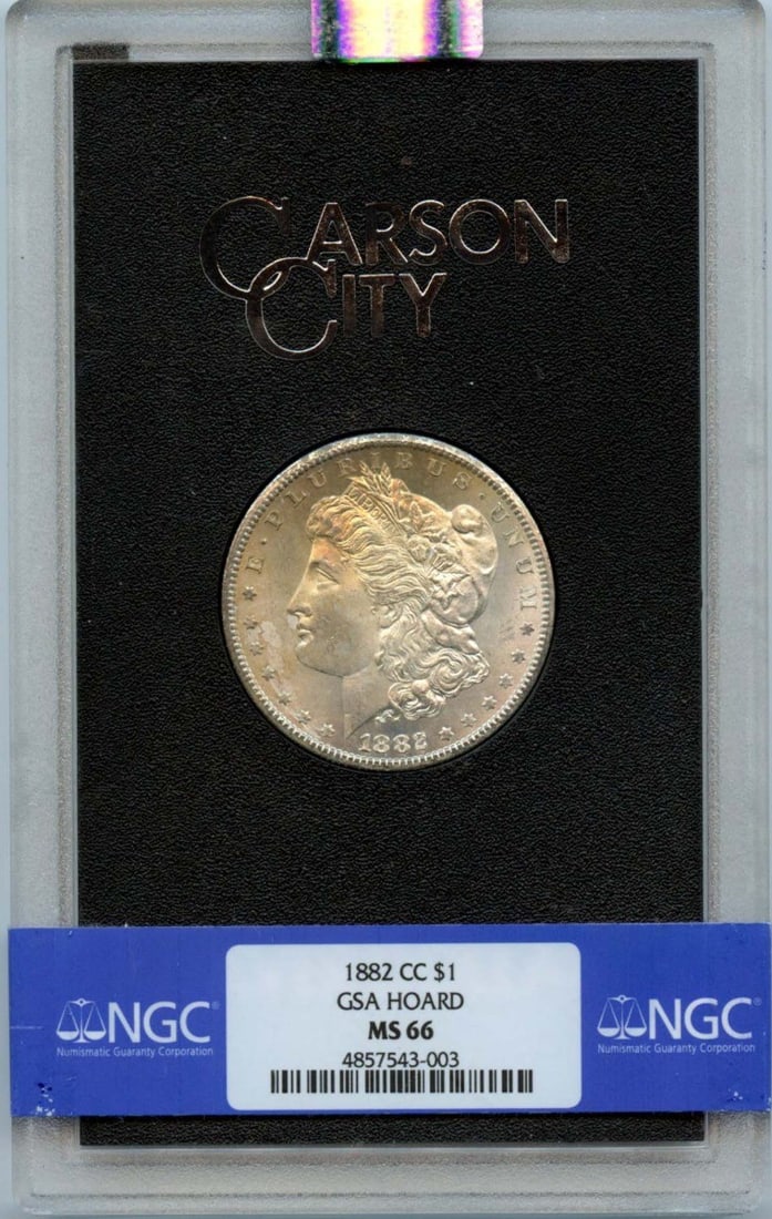 GSA Hoard 1882 CC Morgan Dollar, NGC MS66: GSA Hoard 1882 CC Morgan Dollar, NGC MS66 Experience the majesty of the 1882 Carson City Morgan Dollar, certified by NGC as MS66, one of the finest examples of this iconic coin in existence. With its