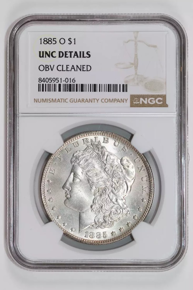 LOOKS 65 GEM+ - 1885-O MORGAN DOLLAR NGC UNC DETAILS: LOOKS 65 GEM+ - 1885-O MORGAN DOLLAR NGC UNC DETAILS Experience the elegance of the American West with this stunning 1885-O Morgan Dollar, certified by NGC as UNC Details. Featuring an 1885 date and m