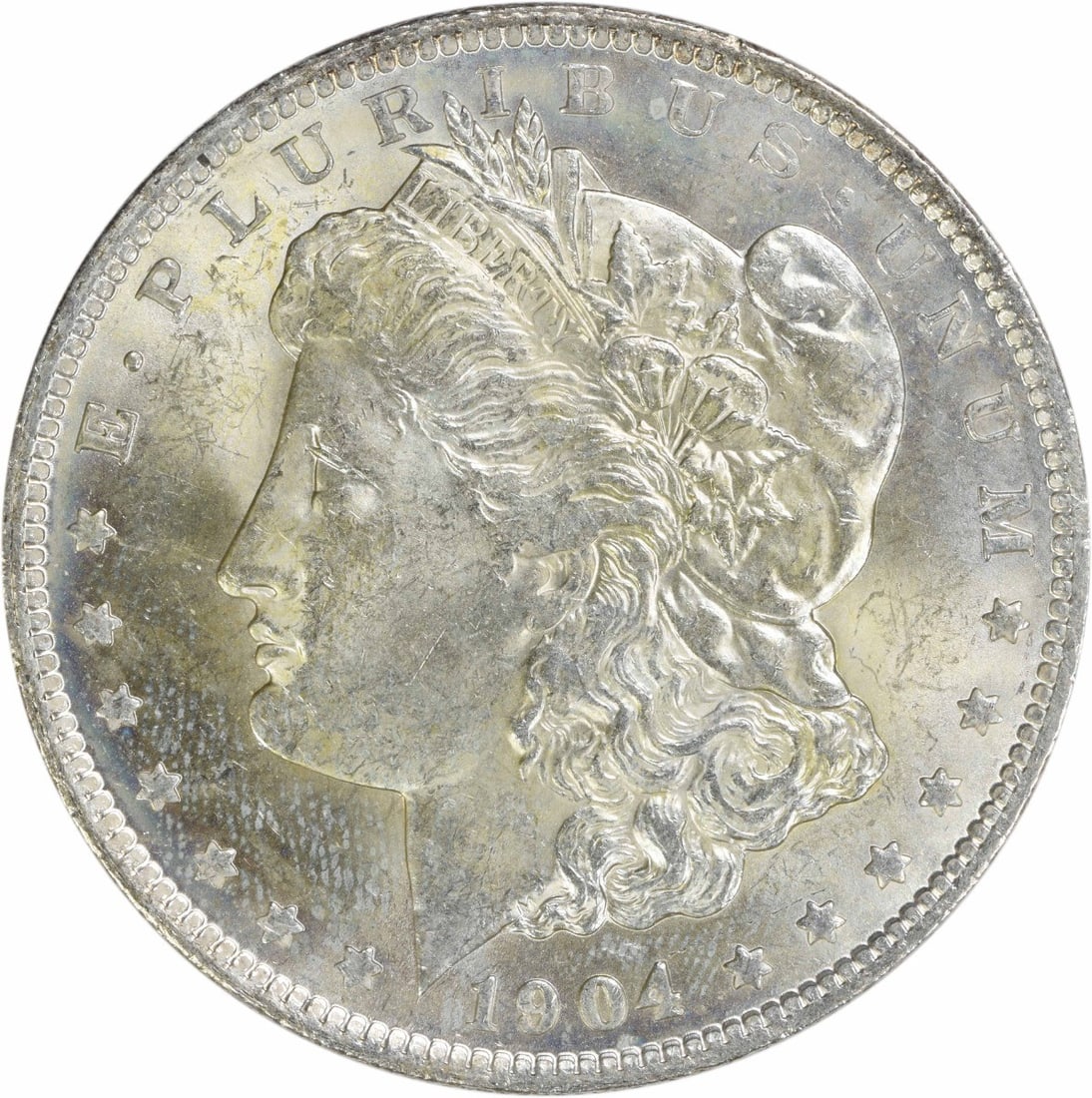 Uncertified 1904-O Morgan Silver Dollar BU: Uncertified 1904-O Morgan Silver Dollar BU Get your hands on a rare 1904-O Morgan Silver Dollar, certified as uncirculated and boasting a brilliant uncirculated condition. This stunning silver dollar