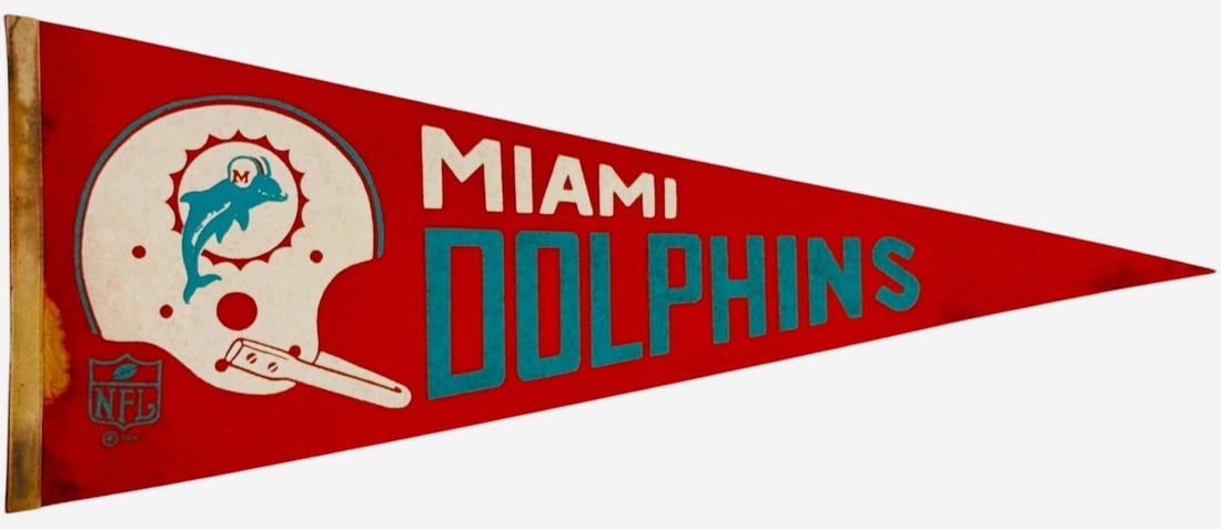 Vintage 1967 Miami Dolphins Large Pennant Banner: Vintage 1967 Miami Dolphins Large Pennant Banner Get ready to relive the excitement of 1967 Miami Dolphins football with this vintage large pennant banner, measuring 12 inches tall and 30 inches long.