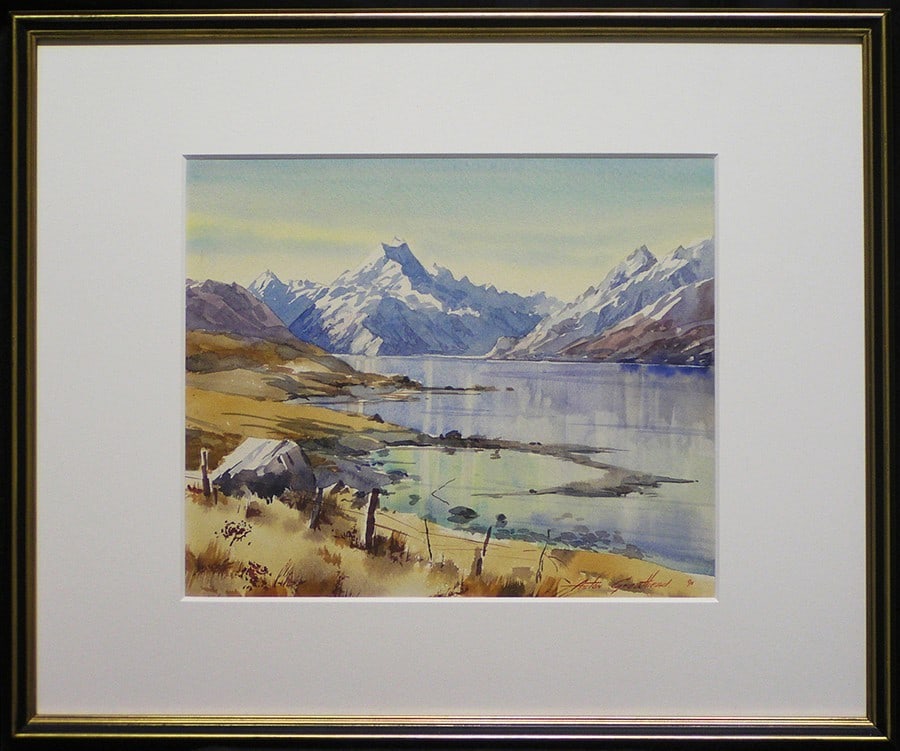 Framed Aston Greathead Original Watercolor Mt Cook Lake Pukaki 1990 Signed: Framed Aston Greathead Original Watercolor Mt Cook Lake Pukaki 1990 Signed Experience the breathtaking beauty of New Zealand's majestic landscape in Aston Greathead's stunning watercolor painting, 'Mt