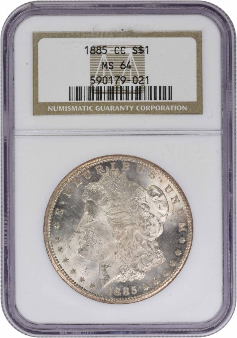 Morgan Silver Dollar (MS64) - 1885 CC: Morgan Silver Dollar (MS64) - 1885 CC Experience the beauty and rarity of the 1885 Morgan Silver Dollar, certified MS64 by NGC, with its striking CC mint mark and impressive weight of 26.73 grams. Thi