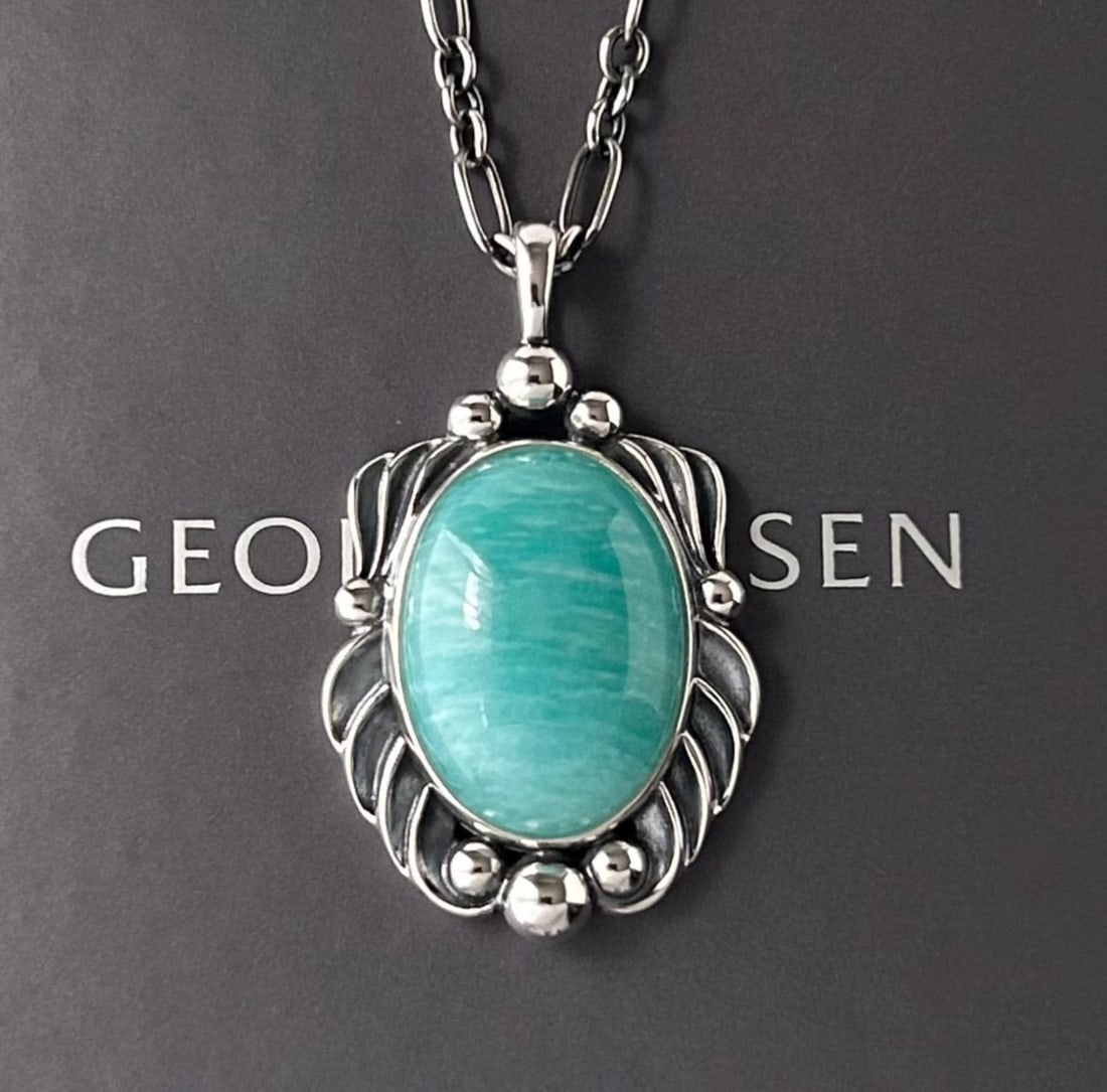 Georg Jensen Amazonite Heritage Pendant in Sterling Silver 17" Necklace: Georg Jensen Amazonite Heritage Pendant in Sterling Silver 17" Necklace Elevate your style with the Georg Jensen Amazonite Heritage Pendant, a stunning sterling silver piece adorned with a beautiful b