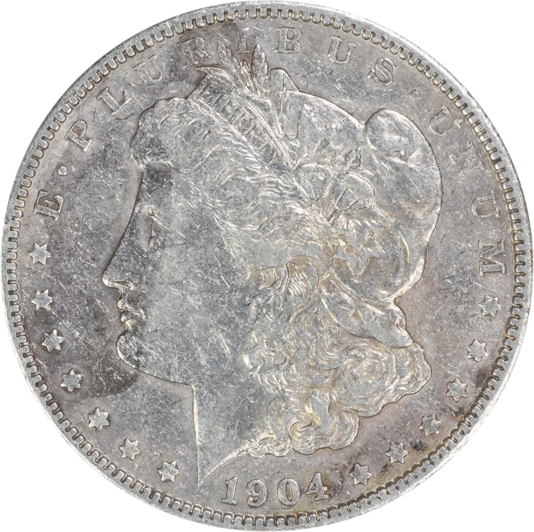 Morgan Silver Dollar (EF) - 1904: Morgan Silver Dollar (EF) - 1904 A rare and historic Morgan Silver Dollar from 1904, this circulated coin boasts its original silver content and is graded EF for excellent condition. With its reeded e