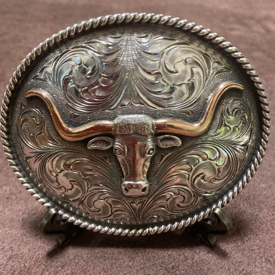 Sterling Silver 925 10K Rare Clint Orms Trophy Buckle: Sterling Silver 925 10K Rare Clint Orms Trophy Buckle A true piece of Western Americana, this stunning sterling silver 925 10K trophy buckle is a rare find from renowned artist Clint Orms. Handcrafted