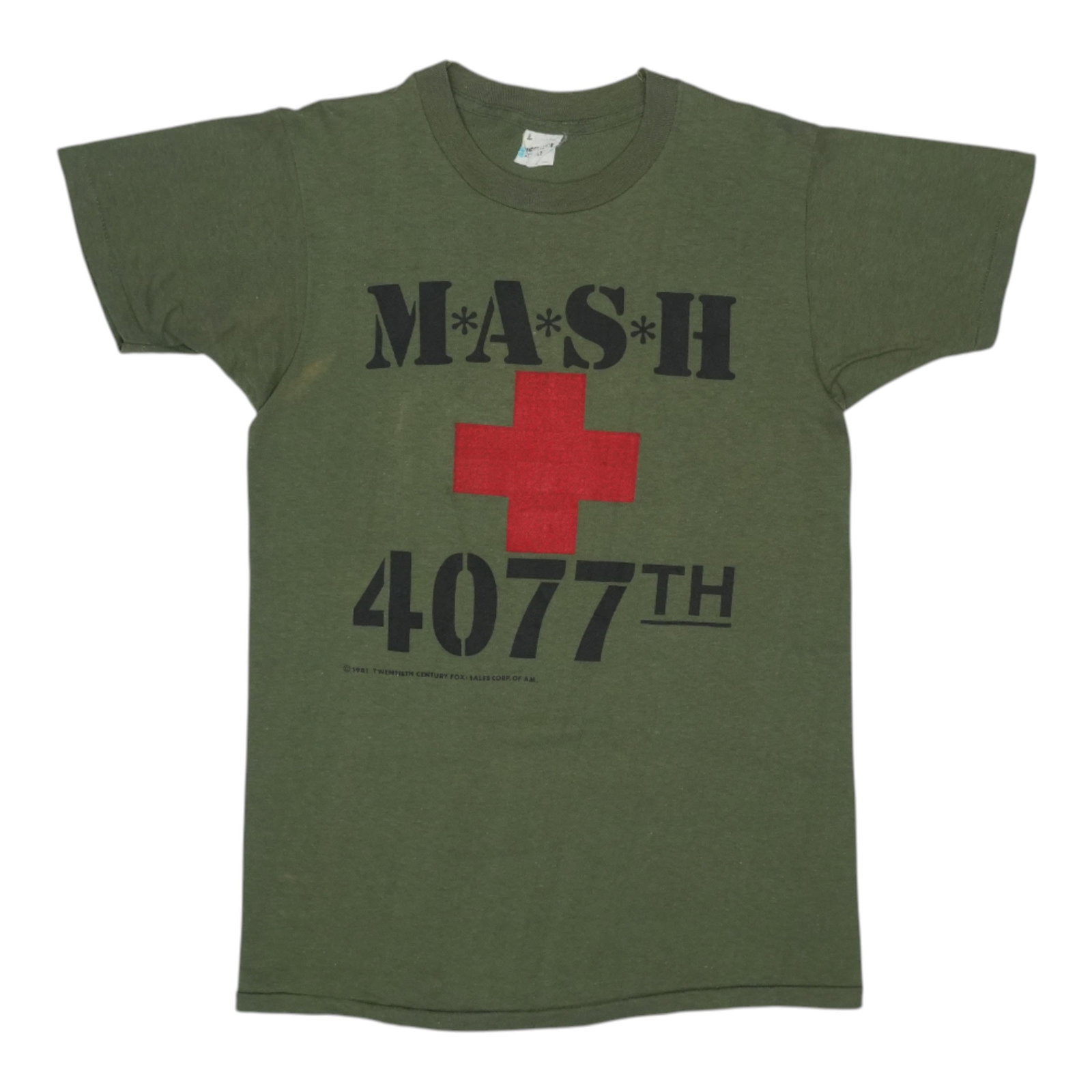 MASH 4077th 1981 Shirt: MASH 4077th 1981 Shirt Get ready to channel your inner Hawkeye with this authentic 1981 MASH 4077th shirt, featuring the iconic green color and classic design of the original vintage tee. Measuring in