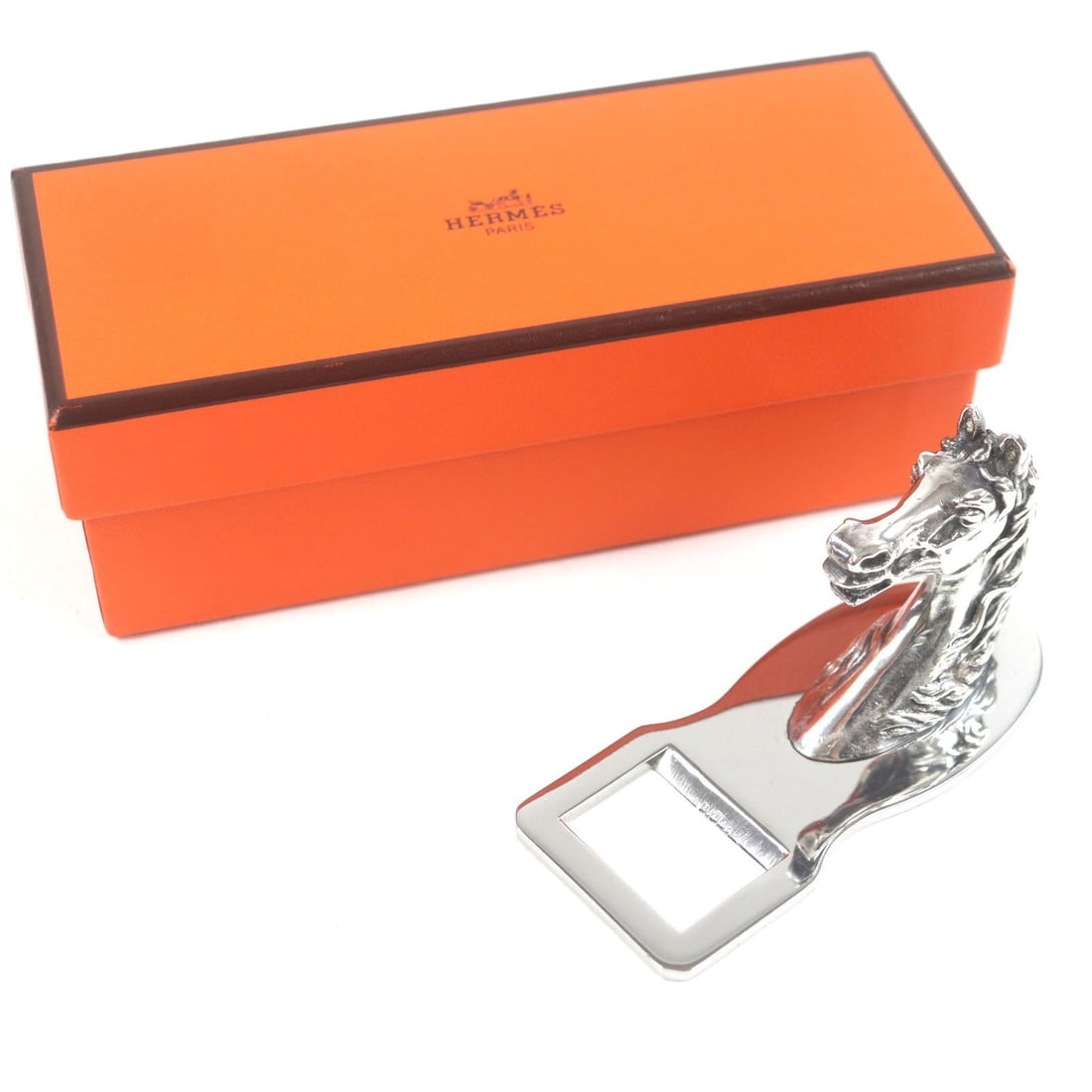 Hermes bottle opener Cheval metal horse motif Silver Vintage Collectible: Hermes bottle opener Cheval metal horse motif Silver Vintage Collectible Add a touch of elegance to your gatherings with this exquisite Hermes bottle opener, crafted from sterling silver and adorned