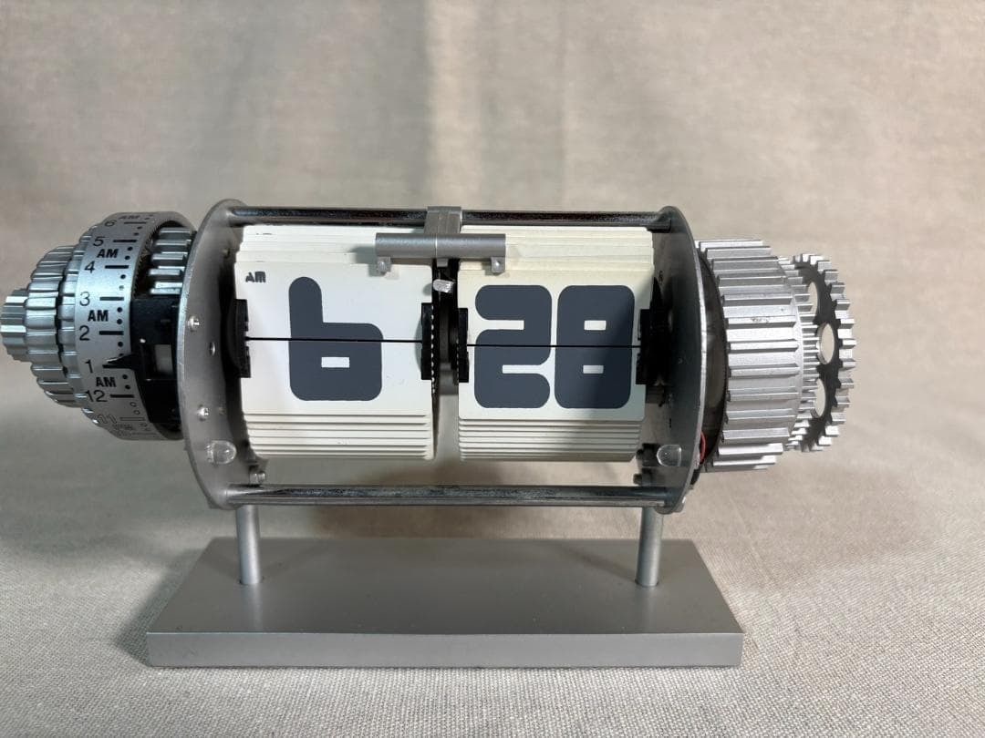 Decor Aluminum Mechanical Flip Clock with Alarm LED Lighting Silver Interior: Decor Aluminum Mechanical Flip Clock with Alarm LED Lighting Silver Interior Elevate your home decor with the sleek and modern Panasonic Aluminum Mechanical Flip Clock, crafted in Japan for its