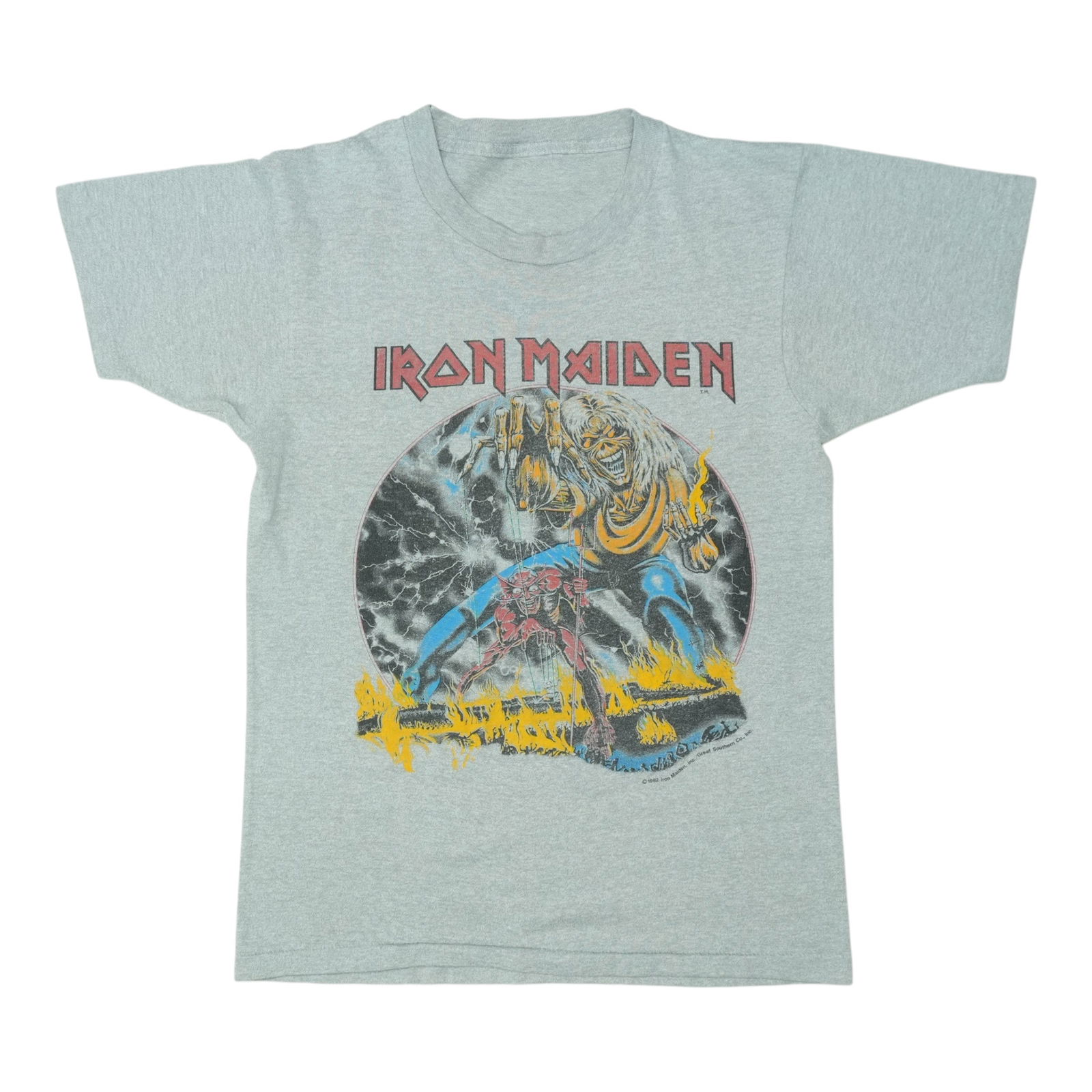Number of the Beast Tour Shirt - 1982 Iron Maiden: Number of the Beast Tour Shirt - 1982 Iron Maiden Get ready to rock with the iconic 1982 Iron Maiden Number of the Beast Tour Shirt, featuring front and back graphics that showcase the band's signatur