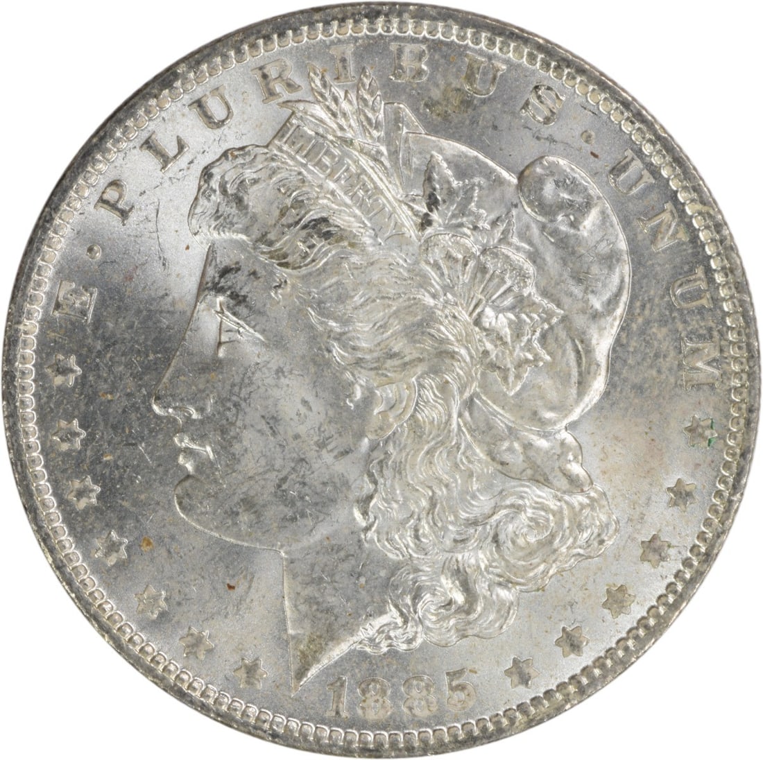 1885-O Morgan Silver Dollar - BU Uncertified: 1885-O Morgan Silver Dollar - BU Uncertified Get your hands on a rare and beautiful piece of American history - the 1885-O Morgan Silver Dollar, certified as BU Uncirculated. This stunning coin is
