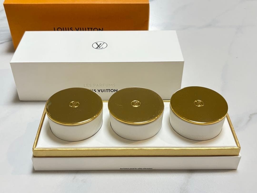 LOUIS VUITTON Perfumed Aroma Mini Candle Set of 3 Scented France Boxed: LOUIS VUITTON Perfumed Aroma Mini Candle Set of 3 Scented France Boxed Indulge in the luxurious ambiance of Louis Vuitton with this exquisite perfumed aroma mini candle set, crafted in Japan and featu