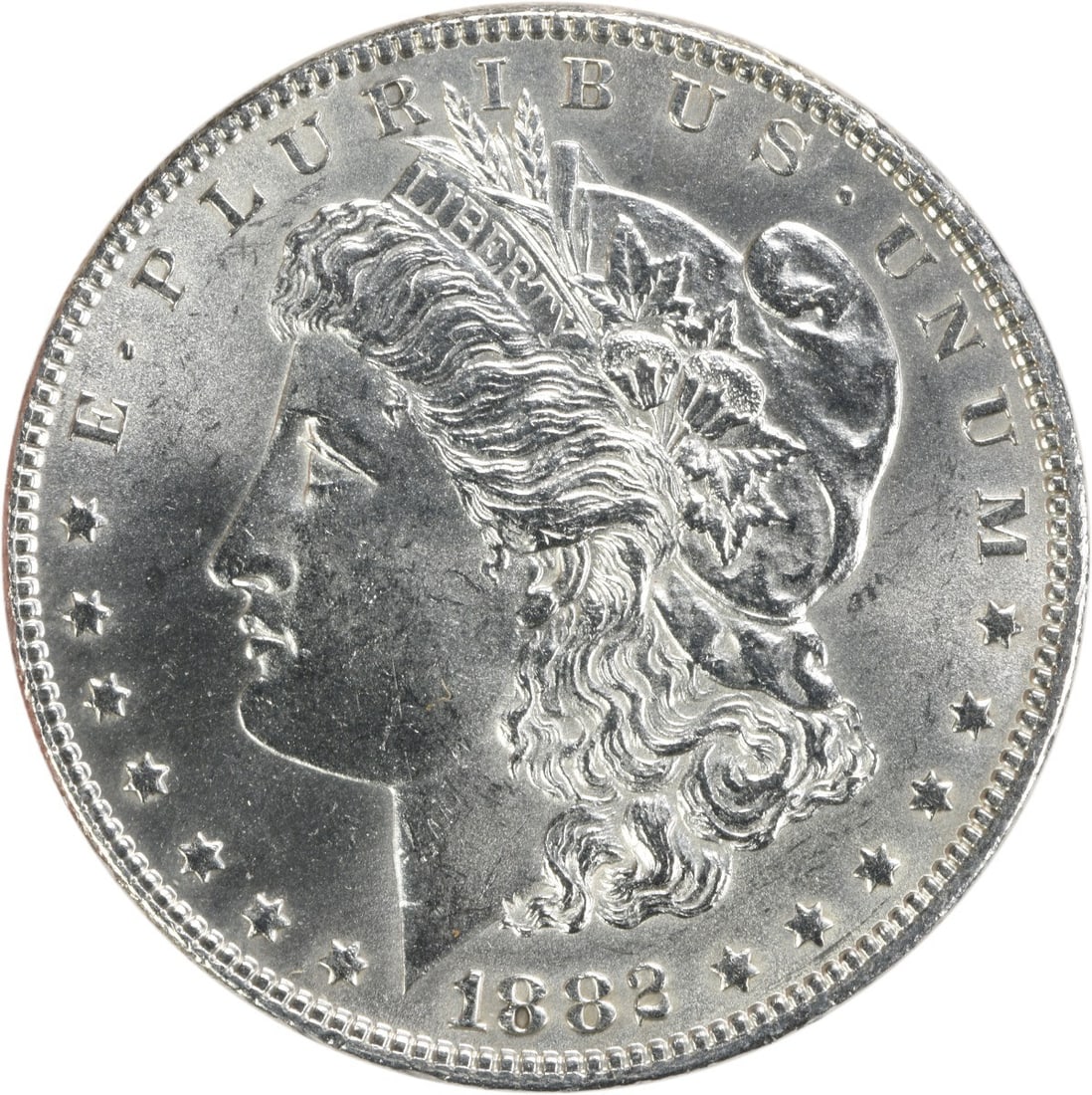Morgan Silver Dollar (1882) - BU Uncertified: Morgan Silver Dollar (1882) - BU Uncertified This 1882 Morgan Silver Dollar is a rare and highly sought-after coin, featuring the iconic Lady Liberty design on its obverse and an eagle on its reverse.