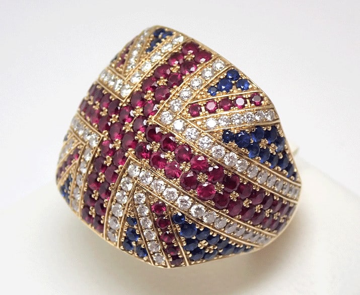 Ring Asprey Union Jack 18k Yellow Gold Ruby 2.43ct Sapphire Diamond Statement: Ring Asprey Union Jack 18k Yellow Gold Ruby 2.43ct Sapphire Diamond Statement Make a statement with the Asprey Union Jack ring, set in 18k yellow gold and adorned with a stunning ruby and diamond sapp