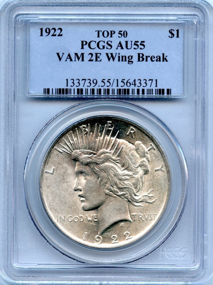 AU55 C5058- 1922 VAM-2E WING BREAK TOP 50 PEACE DOLLAR PCGS: AU55 C5058- 1922 VAM-2E WING BREAK TOP 50 PEACE DOLLAR PCGS Experience the beauty of a rare 1922 Peace Dollar, certified by PCGS as AU55 and featuring a striking wing break top, making it a true