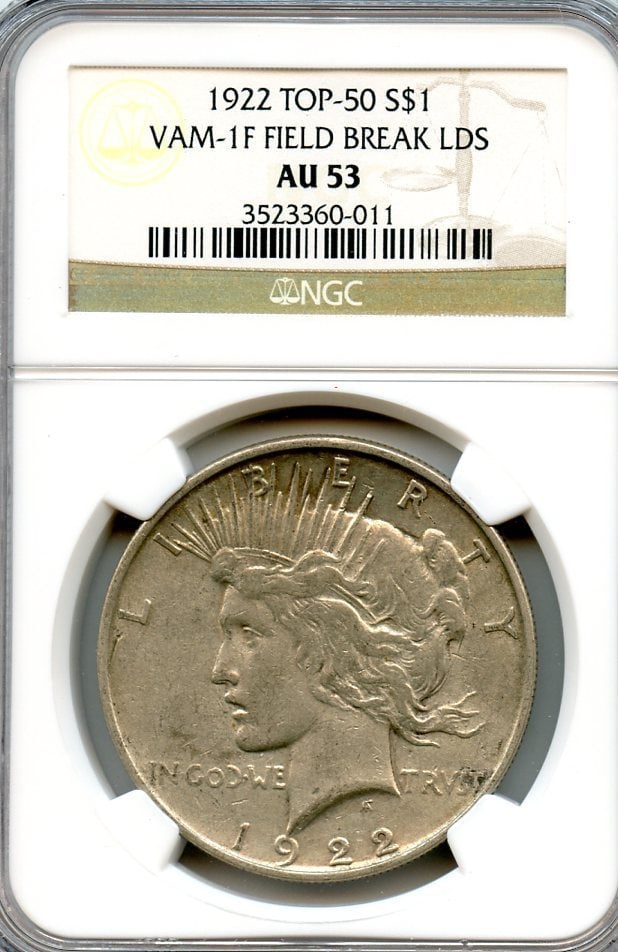 AU53 C4668- 1922 VAM-1F "FIELD BREAK" LDS TOP 50 PEACE DOLLAR NGC: AU53 C4668- 1922 VAM-1F "FIELD BREAK" LDS TOP 50 PEACE DOLLAR NGC Experience the rare beauty of the 1922 Peace Dollar, graded AU53 by NGC and certified as a circulated coin with a unique "field break"