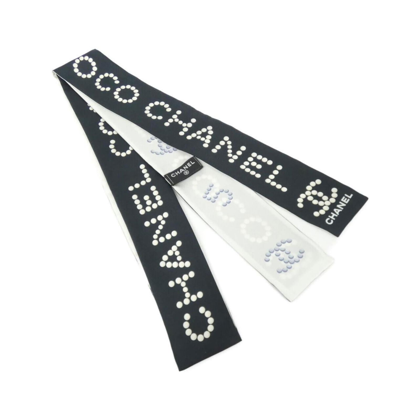 Chanel Silk Headband: Chanel Silk Headband Elevate your style with this luxurious Chanel silk headband, crafted from high-quality silk and boasting the iconic French fashion house's signature elegance. Its sleek black