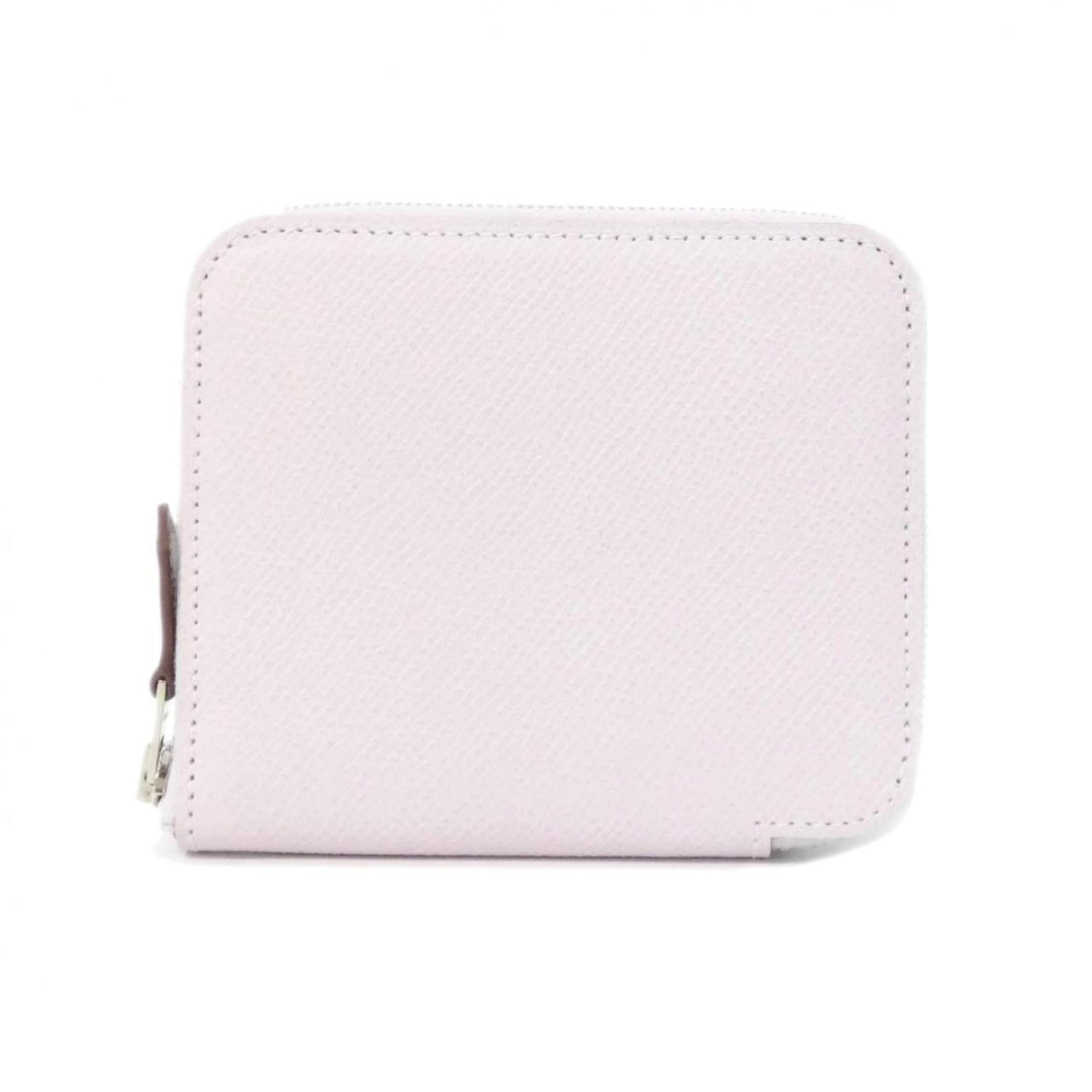 Silk - Hermes Wallet (Bi-Fold) Epsom Leather: Silk - Hermes Wallet (Bi-Fold) Epsom Leather A stunning bi-fold wallet from the iconic French house of Hermes, crafted in rich Epsom leather and adorned with elegant silk accents in a soft pink hue.