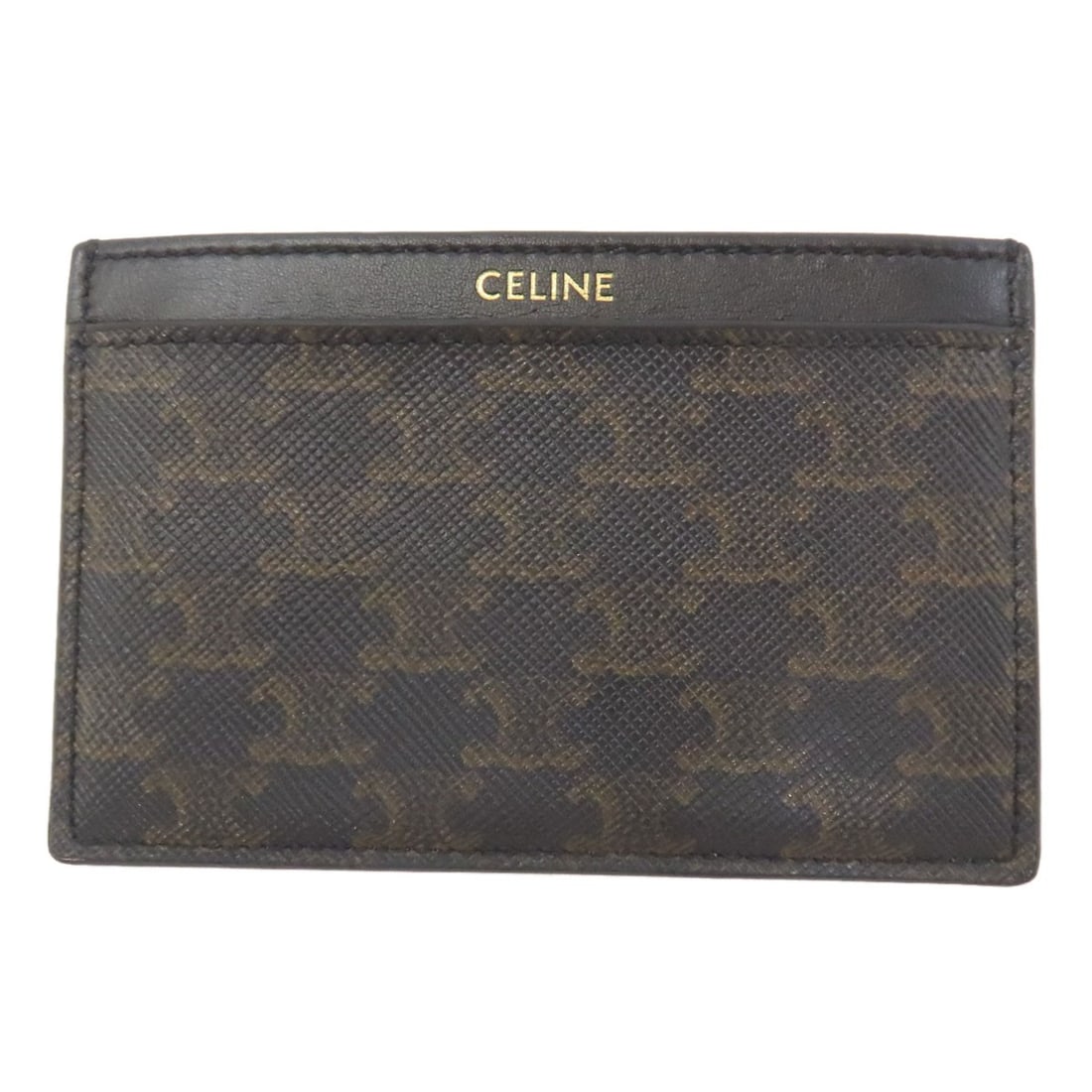 Celine Triomphe Card Case in PVC: Celine Triomphe Card Case in PVC The Celine Triomphe Card Case in PVC is a sleek and sophisticated accessory that adds a touch of luxury to any outfit. Made from high-quality PVC, this card case