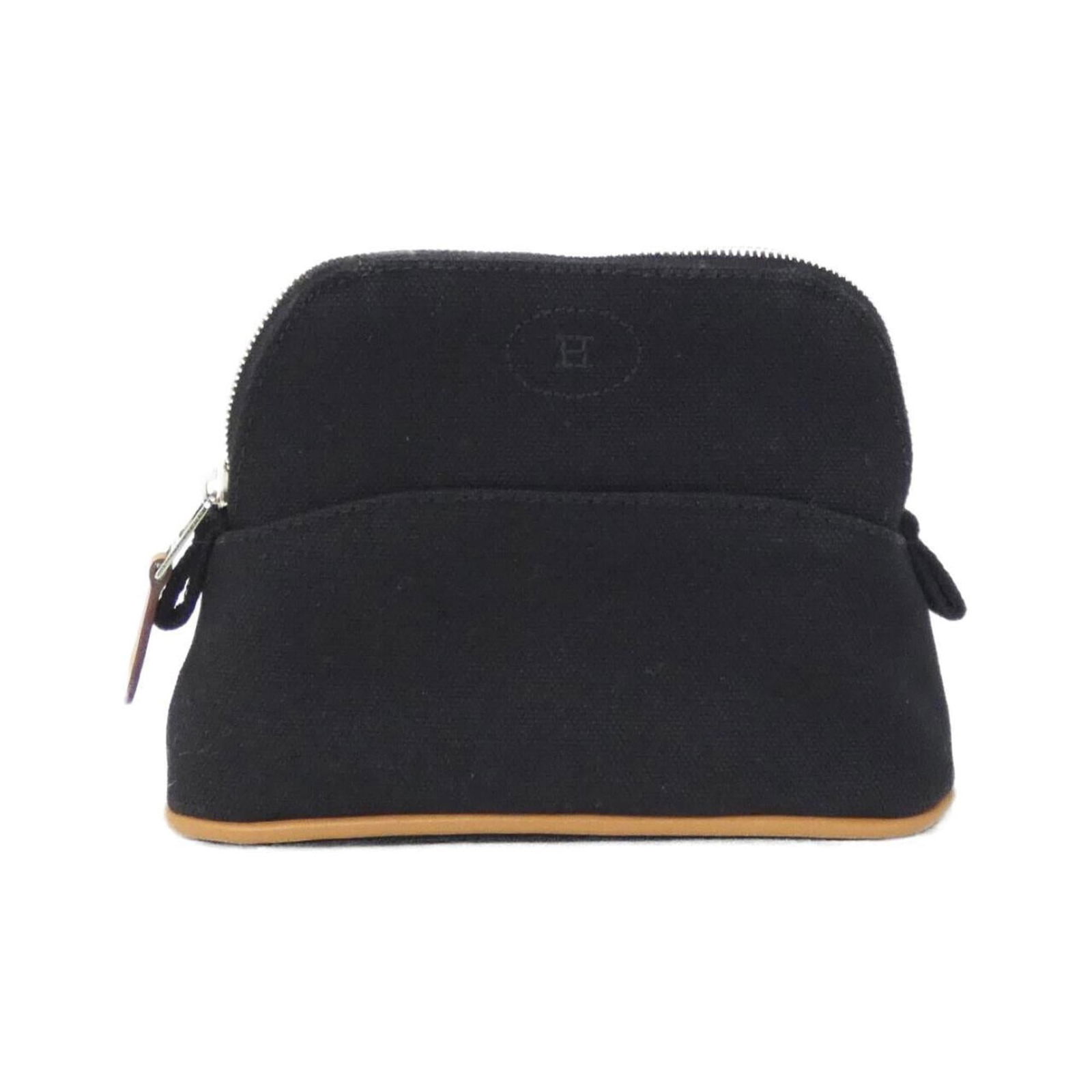 Hermes Canvas Pouch: Hermes Canvas Pouch A timeless and versatile canvas pouch from the iconic French brand Hermes, boasting a sleek black finish that exudes understated elegance. With its compact size and durable constru