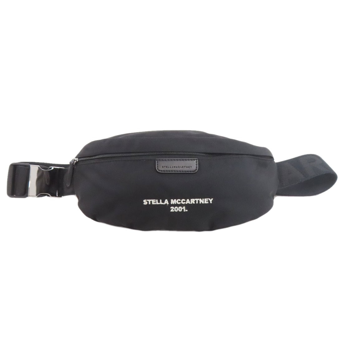 Stella McCartney Logo Body Bag in Nylon: Stella McCartney Logo Body Bag in Nylon Elevate your everyday style with the sleek Stella McCartney logo body bag, crafted from high-quality nylon in a timeless black hue. The understated yet