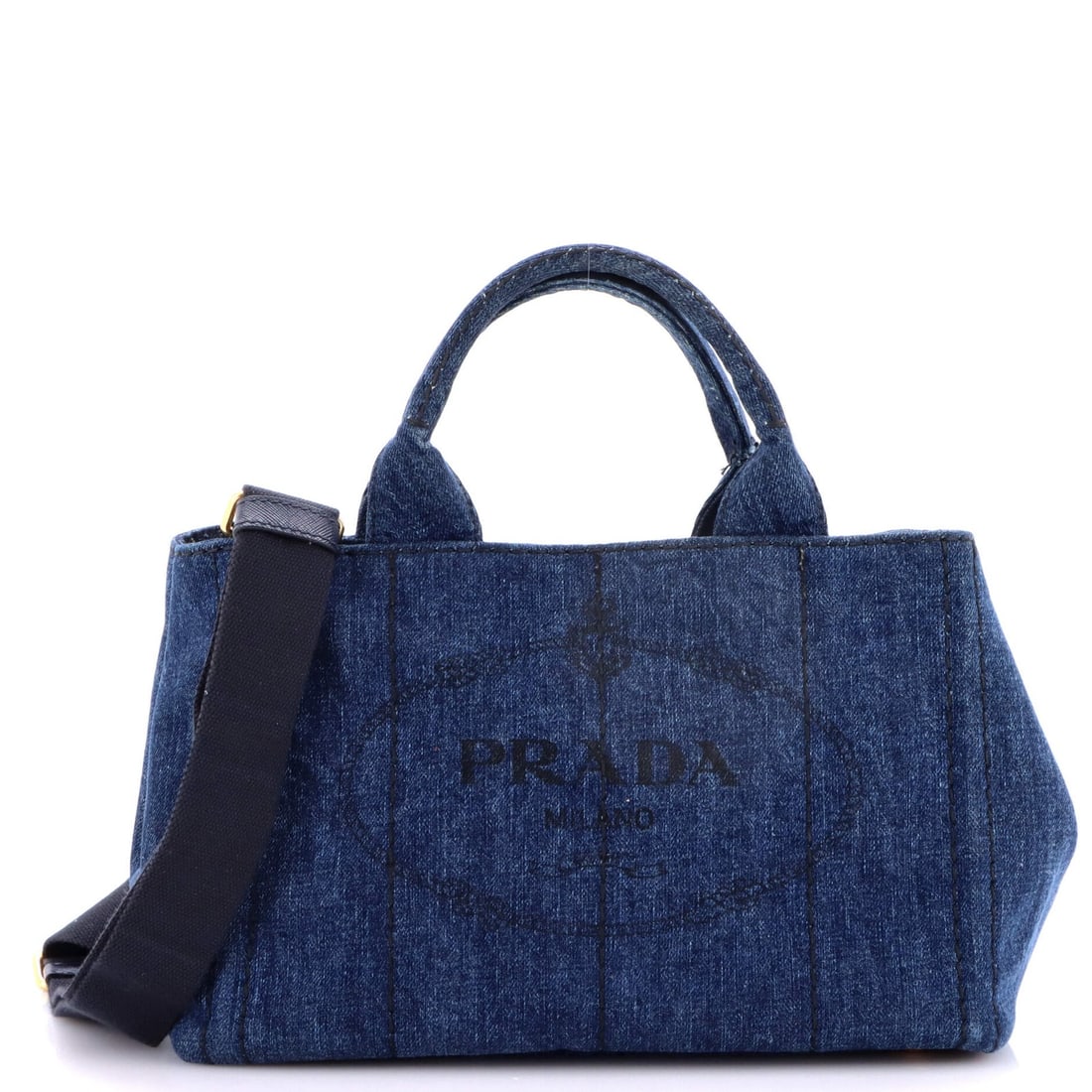 Prada Canapa Convertible Denim Mini Tote: Prada Canapa Convertible Denim Mini Tote Elevate your everyday style with the Prada Canapa Convertible Denim Mini Tote, a chic and versatile accessory that seamlessly transitions from work to play.