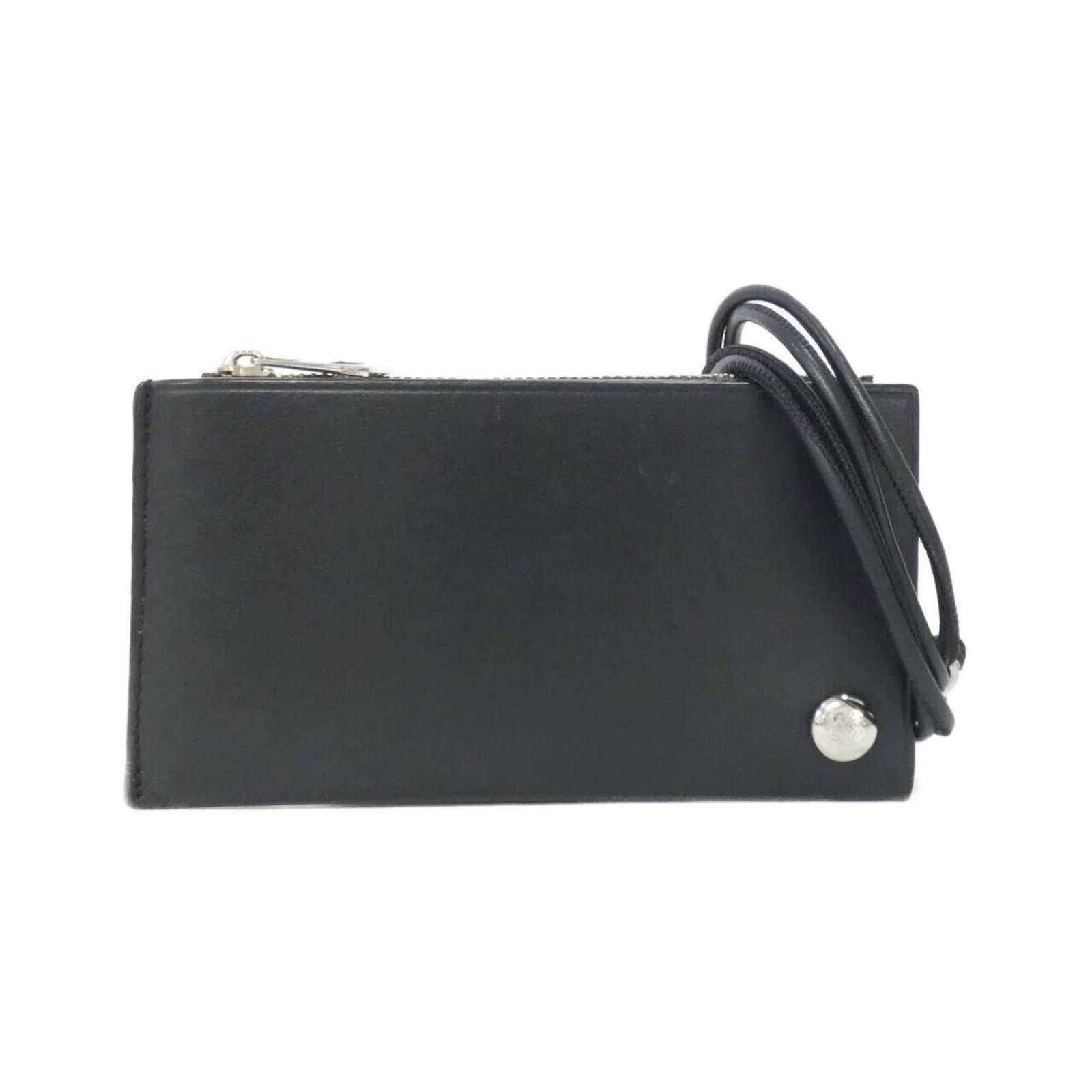 Loewe Coin Purse/ Case Leather: Loewe Coin Purse/ Case Leather A sleek and sophisticated accessory, this Loewe coin purse is crafted from rich calfskin leather in a timeless black finish. Its compact size makes it the perfect