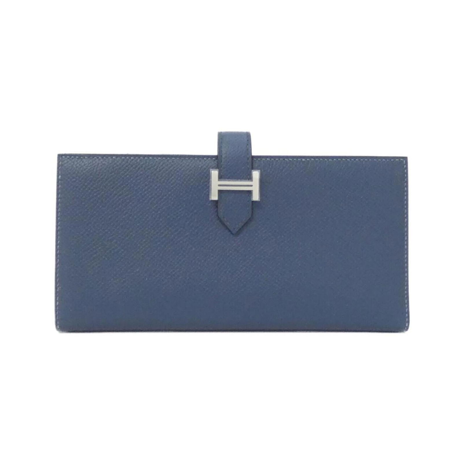 Hermes Bi-Fold Epsom Leather Wallet: Hermes Bi-Fold Epsom Leather Wallet A rare opportunity to own a pre-owned Hermes Bi-Fold Epsom Leather Wallet, boasting the iconic brand's signature style and exceptional craftsmanship. Made from rich