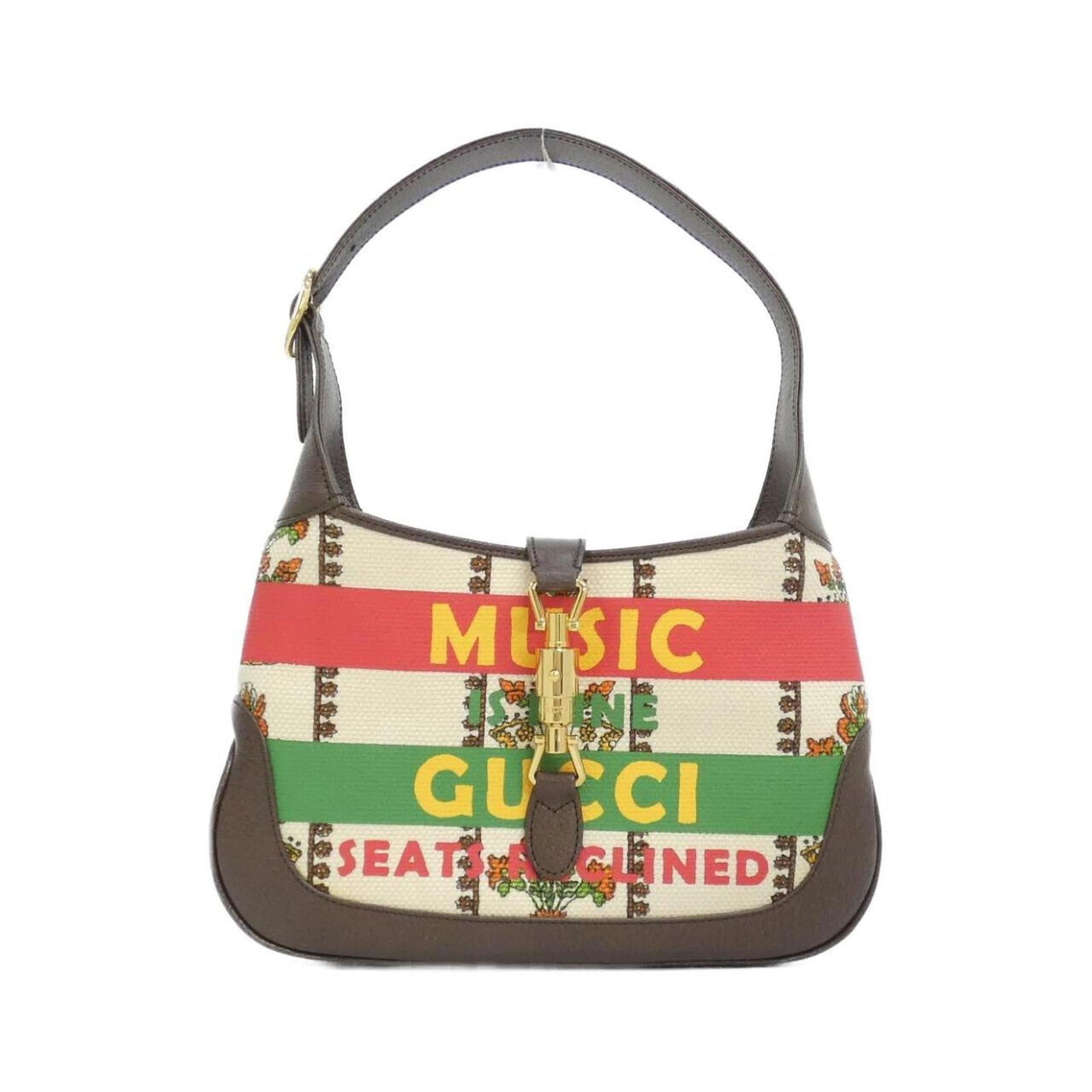 Gucci Canvas and Leather Shoulder Bag: Gucci Canvas and Leather Shoulder Bag A stylish and versatile Gucci shoulder bag, crafted from canvas and leather in rich brown and ivory hues. With its classic design and spacious interior, this