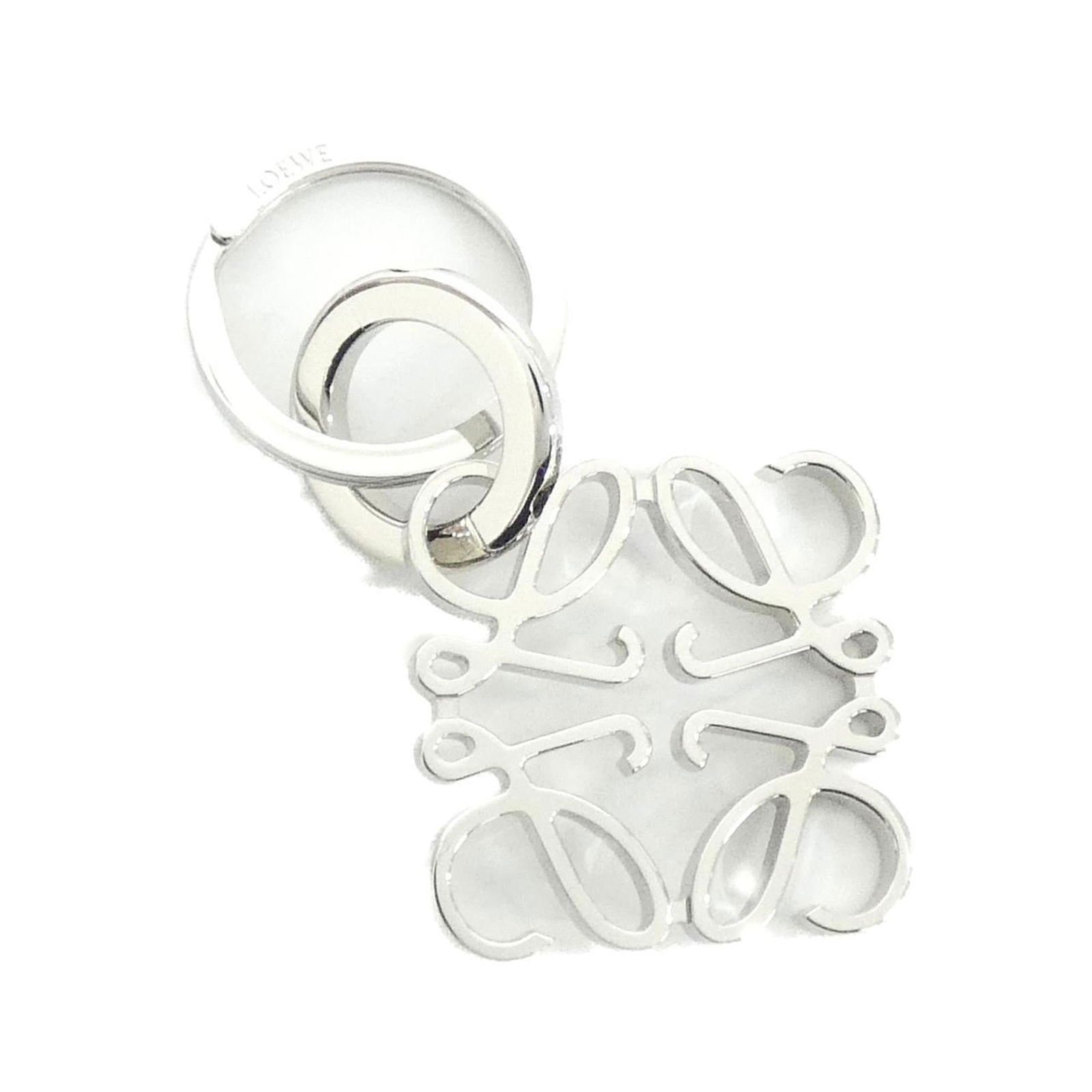 Keyring Loewe: Keyring Loewe A sleek and sophisticated accessory for the modern individual, this vintage Loewe keyring boasts a stunning silver finish that adds a touch of elegance to any outfit. With its classic