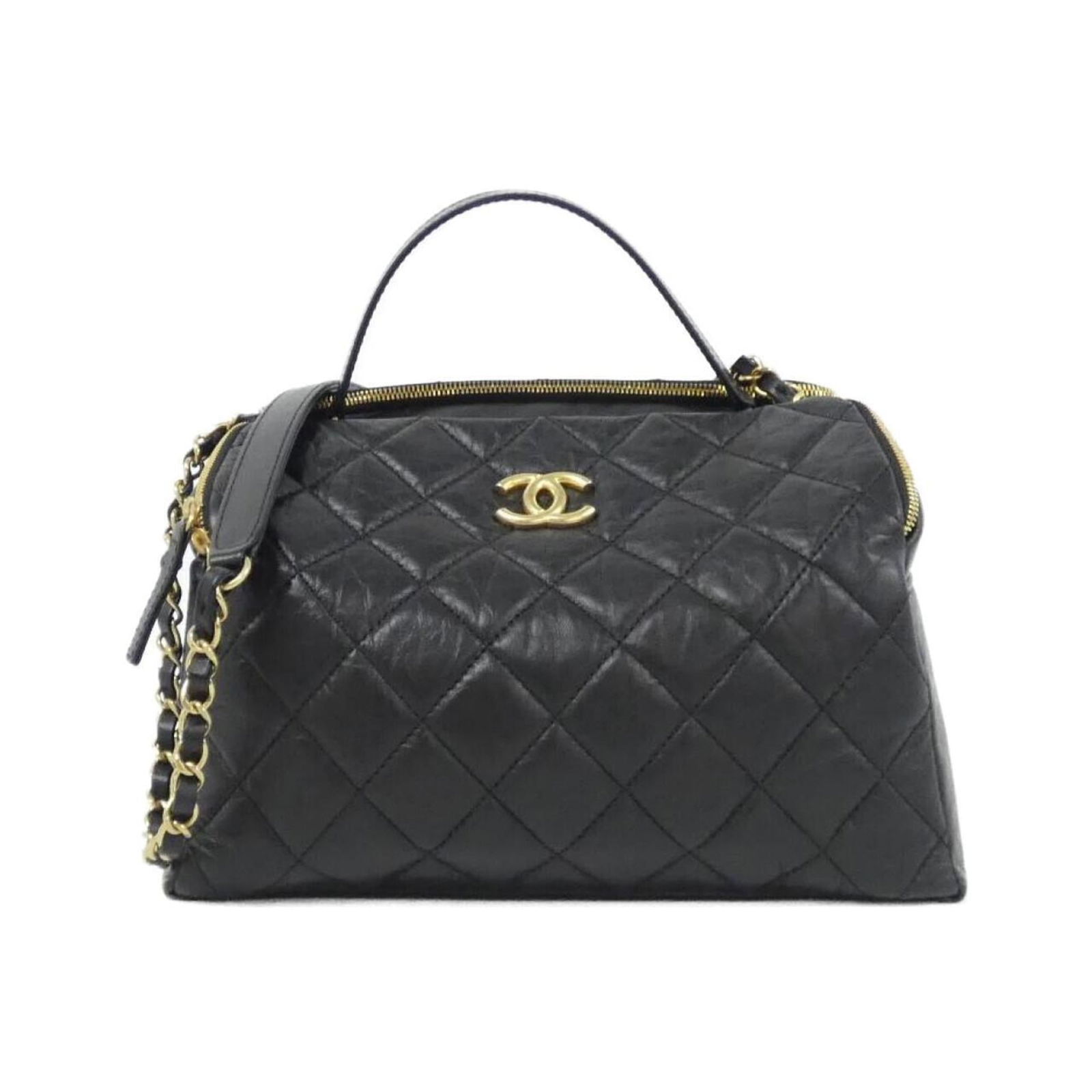 Leather Chanel Handbag: Leather Chanel Handbag A stunning black leather Chanel handbag, exuding timeless elegance and sophistication, boasts a classic design with clean lines and premium quality craftsmanship. With its