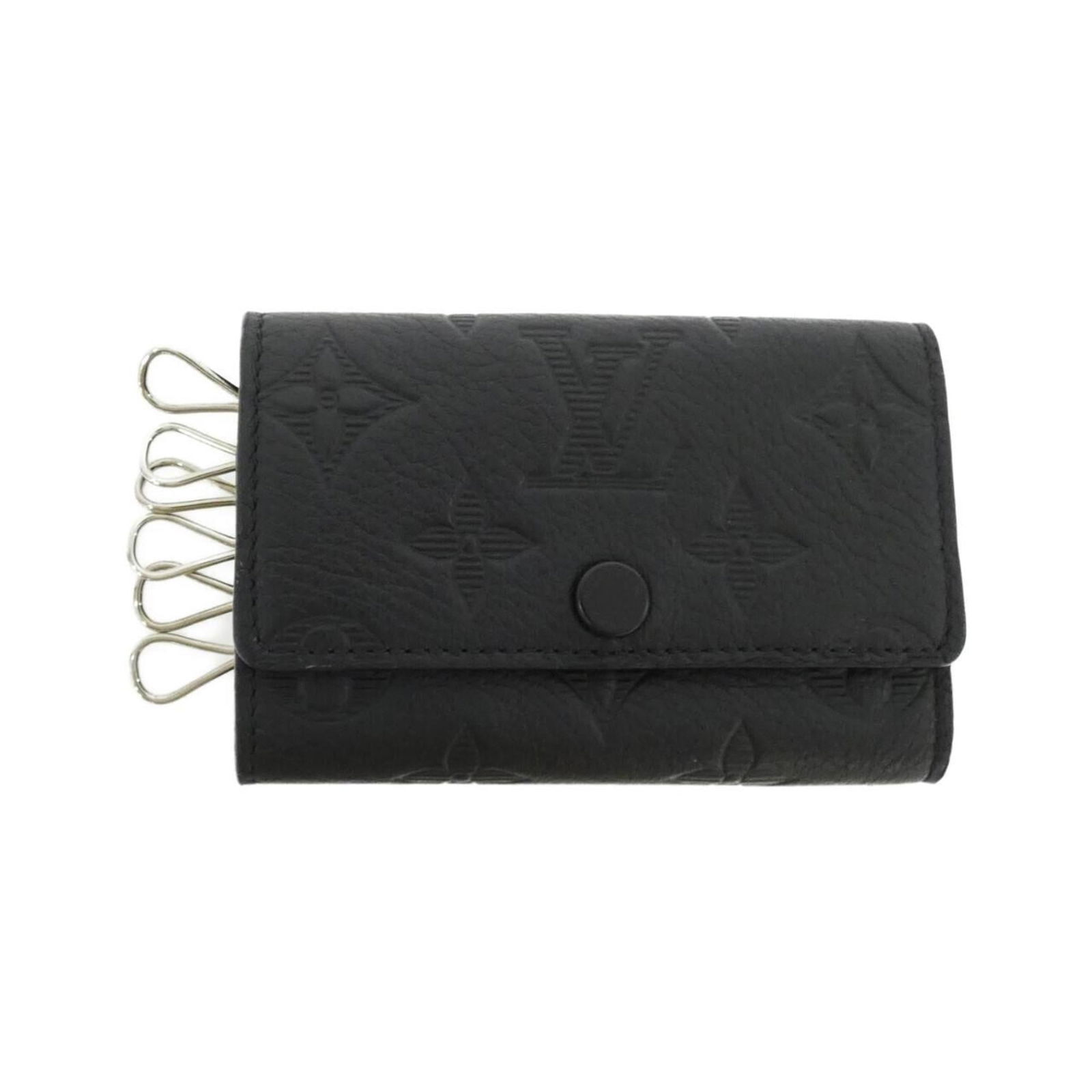 Louis Vuitton Leather Keycase: Louis Vuitton Leather Keycase A sleek and sophisticated accessory for the modern gentleman, this Louis Vuitton leather keycase is crafted from high-quality calf leather in timeless black. With its