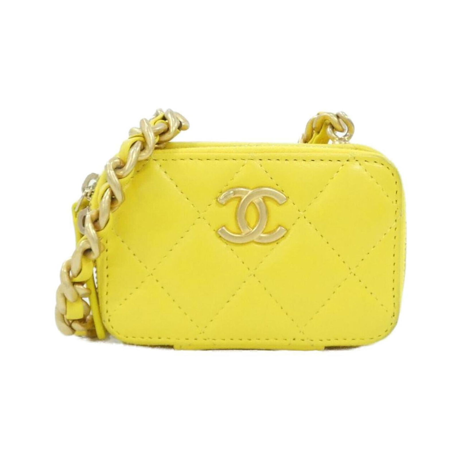 Chanel Shoulder Bag in Leather: Chanel Shoulder Bag in Leather A vibrant yellow lambskin Chanel shoulder bag, exuding classic elegance, adds a pop of sunshine to any outfit. With its timeless design and premium leather