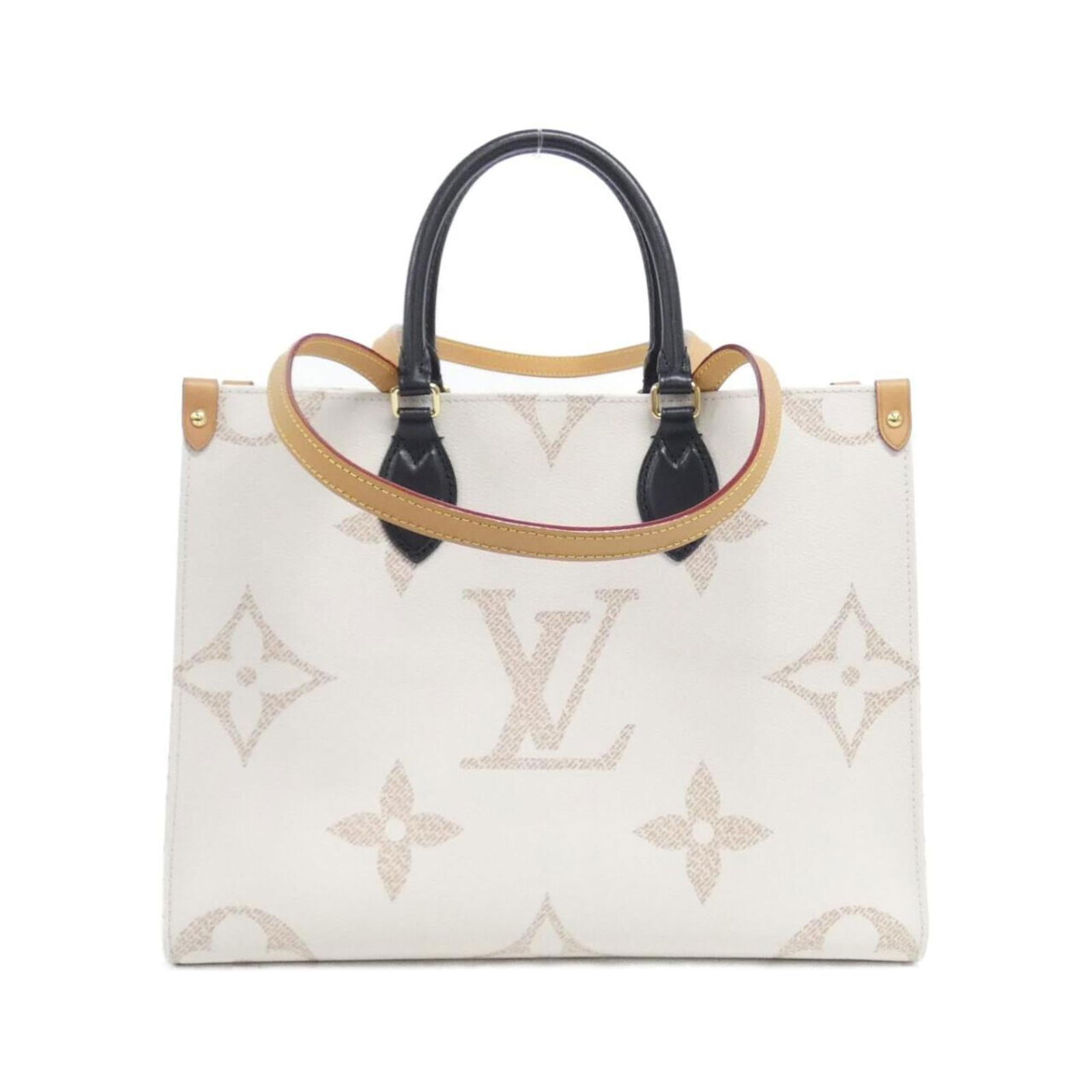 Louis Vuitton Coated Canvas Handbag: Louis Vuitton Coated Canvas Handbag A timeless piece from the iconic Louis Vuitton brand, this coated canvas handbag boasts a classic design with a subtle beige and Dune color palette. With its