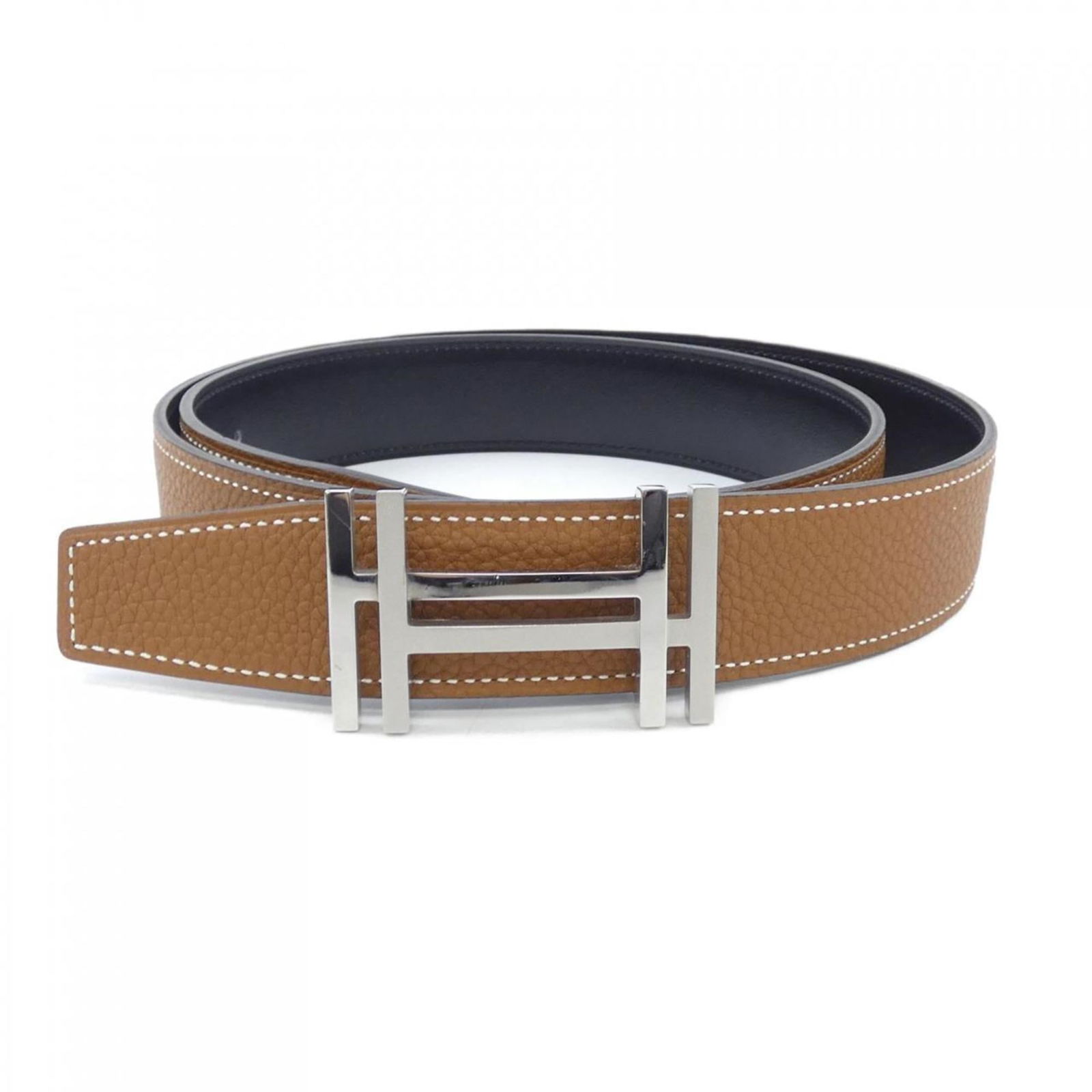 Belt Hermes Standard: Belt Hermes Standard A pre-owned Hermes Standard belt, offering timeless elegance and sophistication, is up for grabs. With its classic design, silver hardware, and durable construction, this belt is