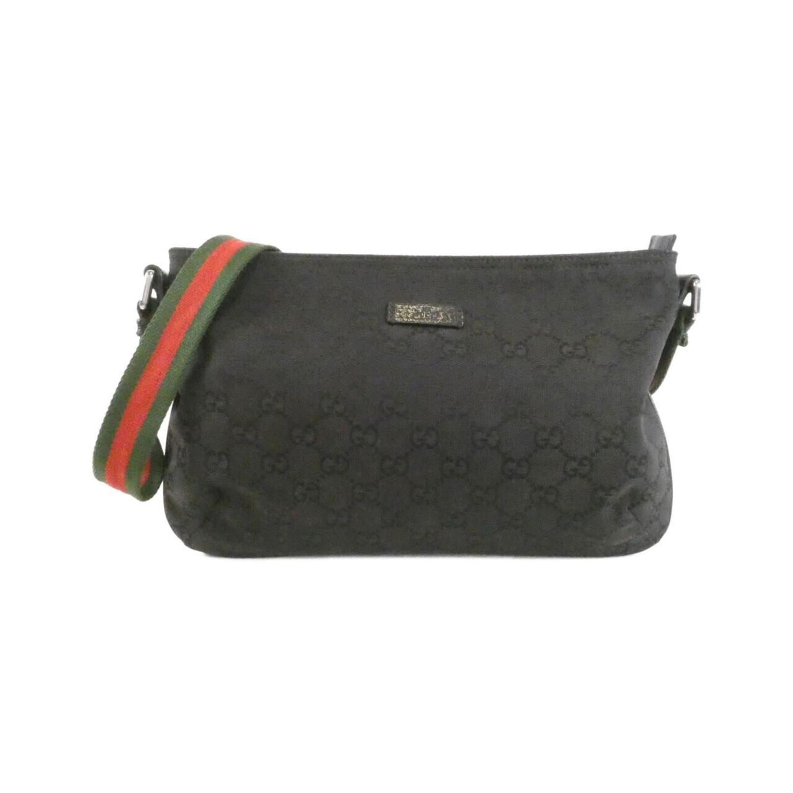 Gucci Canvas Shoulder Bag: Gucci Canvas Shoulder Bag A timeless Gucci canvas shoulder bag in sleek black, perfect for adding an effortless touch of luxury to any outfit. With its spacious interior and comfortable shoulder strap