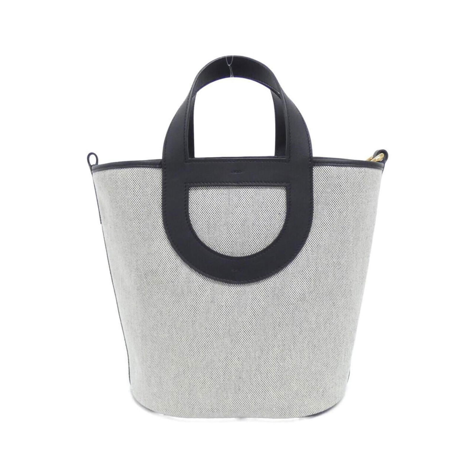 Hermes Swift Leather Toile H Handbag: Hermes Swift Leather Toile H Handbag A timeless piece of luxury, the Hermes Swift Leather Toile H Handbag exudes understated elegance with its sleek black and ecru color scheme, adorned with gold